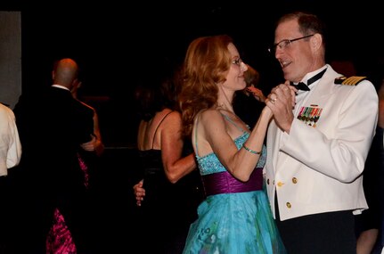 Capt. Steve Brasington and his wife dance the night away during the Joint Base Charleston Military Ball Sept. 24, 2011. The evening consisted of the posting of the Colors by an honor guard made up of all services, dinner, dancing and a presentation from guest speaker Coach Darrin Horn, University of South Carolina Gamecock's head basketball coach. More than 800 service members from across the joint base, encompassing Army, Navy, Air Force and Marine Corps, attended the military ball. Brasington is the Executive Officer of Naval Health Clinic Charleston. (U.S. Air Force photo/2nd Lt. Susan Carlson)
