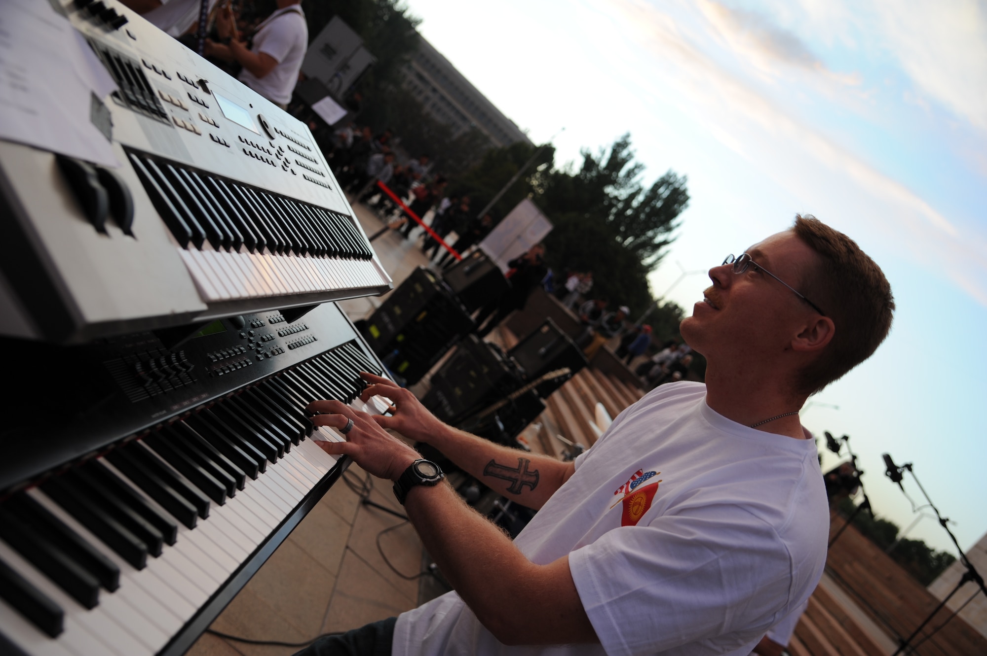 Staff Sgt. Shane Spanier plays the piano during a “Top Cover” performance at A’la Too Square in Bishkek, Kyrgyzstan, Sept. 23. During their deployment the U.S. Air Forces Central Command band Top Cover will perform for host nation audiences and servicemembers in seven countries. Spanier is a pianist deployed from Joint Base Elmendorf-Richardson, Alaska. (U.S. Air Force photo/Tech. Sgt. Hank Hoegen)