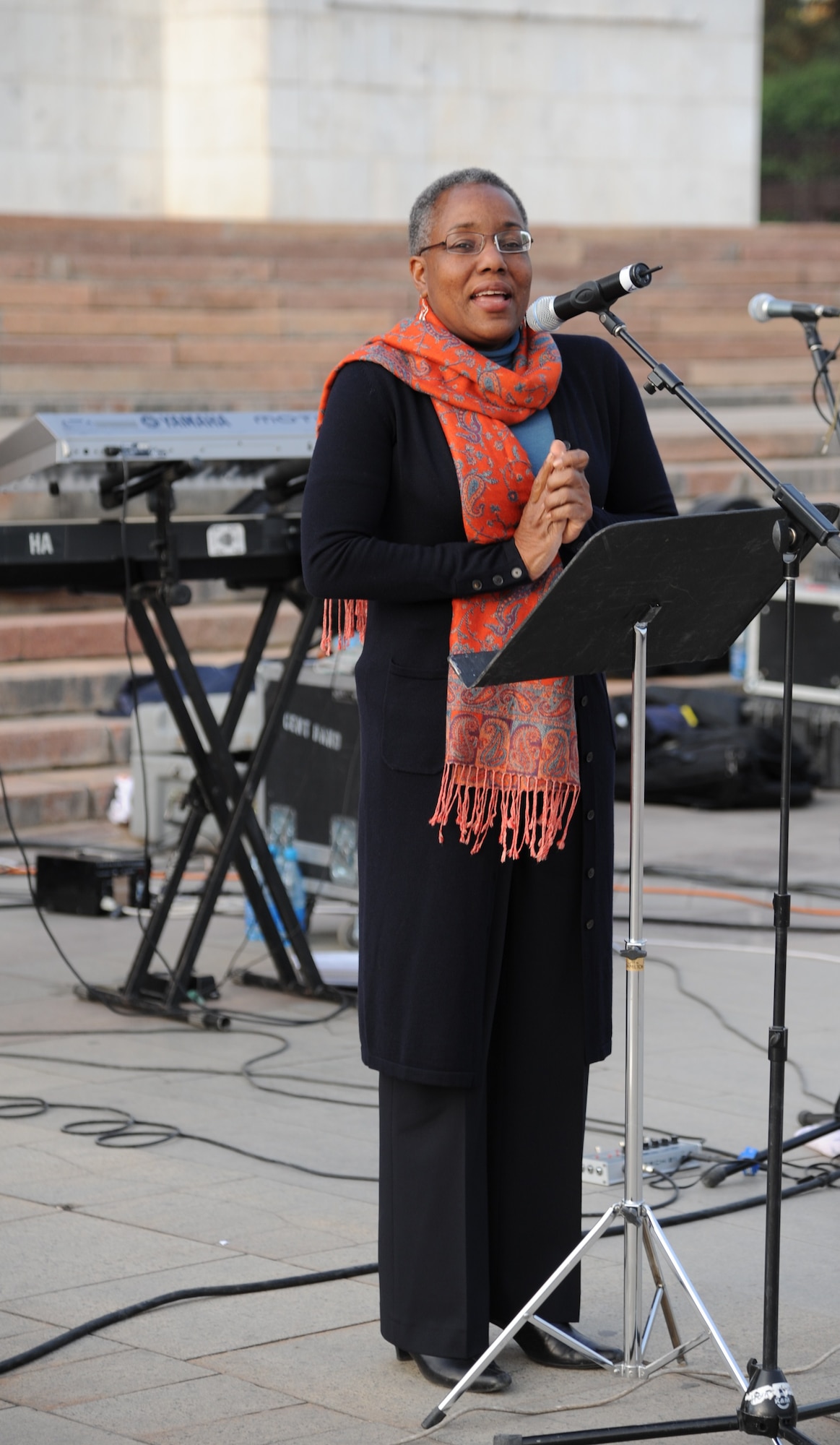 The Honorable Pamela Spratlen, U.S. Ambassador to the Kyrgyz Republic, makes opening remarks before a “Top Cover” performance at A’la Too Square in Bishkek, Kyrgyzstan, Sept. 23. Top Cover is a seven-member U.S. Air Forces Central Command band. The first stop on the band’s tour of seven countries was the Kyrgyz Republic where they played two shows at the Transit Center at Manas and six concerts at various locations off the installation. (U.S. Air Force photo/Tech. Sgt. Hank Hoegen) 