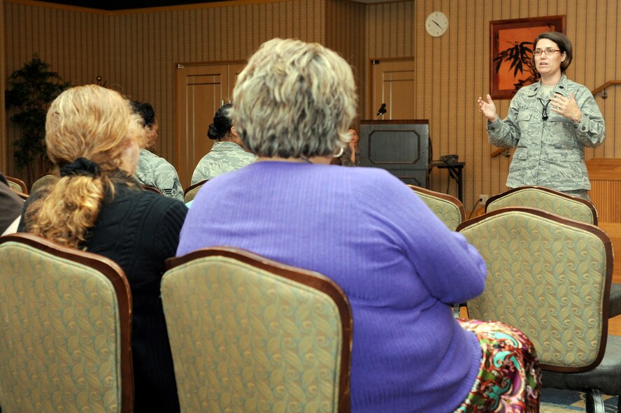 MISAWA AIR BASE, Japan - Lt. Col. Suzette Seuell, 35th Fighter Wing Staff Judge Advocate, gives a legal briefing during a simulated town hall meeting here Sept. 29. The simulation was part of an exercise testing the wing's ability to deploy its forces. A cross-section of base agencies briefed military dependents and answered their questions regarding the simulated deployment and what services will be available to sustain and assist them in the event their loved ones deploy. (U.S. Air Force photo/Tech. Sgt. Marie Brown)