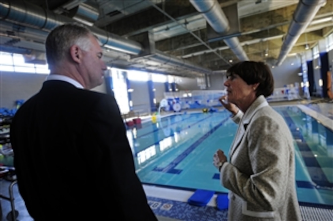 Deputy Defense Secretary William J. Lynn III tours the aquatic training and rehabilitation facility with program manager Dr. Rebecca Hooper at Brooke Army Medical Center's Center for the Intrepid in San Antonio, Sept. 28, 2011.