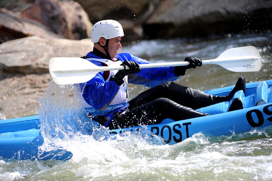 Capt. Nicholas Schroback, from the Marine Corps Institute, kayaks down stream during the Whitewater Wipeout at Deep Creek Lake, Md., Sept. 29, 2011. Schroback is the overall points leader in the race for Marine Barracks Washington's 2011 Commander's Cup.
