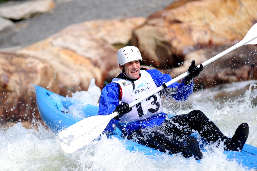 Chief Warrant Officer Matt Carter kayaks down stream during the Whitewater Wipeout at Deep Creek Lake, Md., Sept. 29, 2011. Approximately 30 Marines participated in the event, which was a kayaking competition for Marine Barracks Washington's 2011 Commander's Cup.