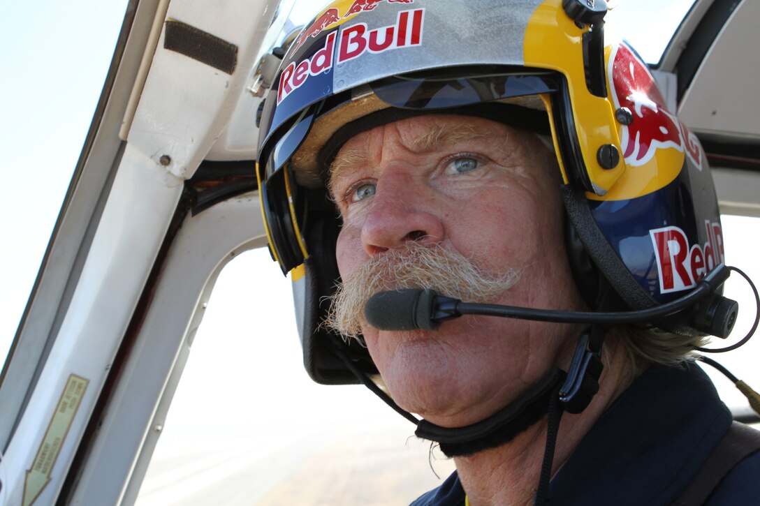 Chuck Aaron, the Red Bull stunt-helicopter pilot, flies over Marine Corps Air Station Miramar during a flight Sept. 29. This helicopter participates in air show events across the country to include the annual 2011 MCAS Miramar Air Show. The theme for this year’s show is “A Salute to San Diego: Birthplace of Naval Aviation," honoring the centennial of naval aviation.