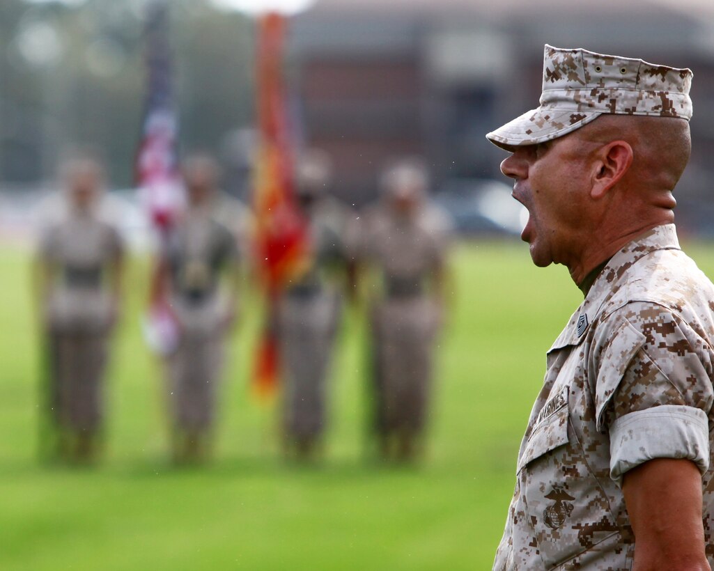 Sgt. Maj. Octaviano Gallegos Jr., the command Sgt. Maj. for the 24th Marine Expeditionary Unit, gives the command "March on the Colors" during the MEU's activation ceremony at W.P.T. Hill Field, Camp Lejeune, N.C., Sept. 29. The ceremony was held to officially composite the 24th MEU with its subordinate units: Marine Medium Tiltrotor Squadron 261, Battalion Landing Team 1st Battalion, 2nd Marine Regiment, and Combat Logistics Battalion 24.