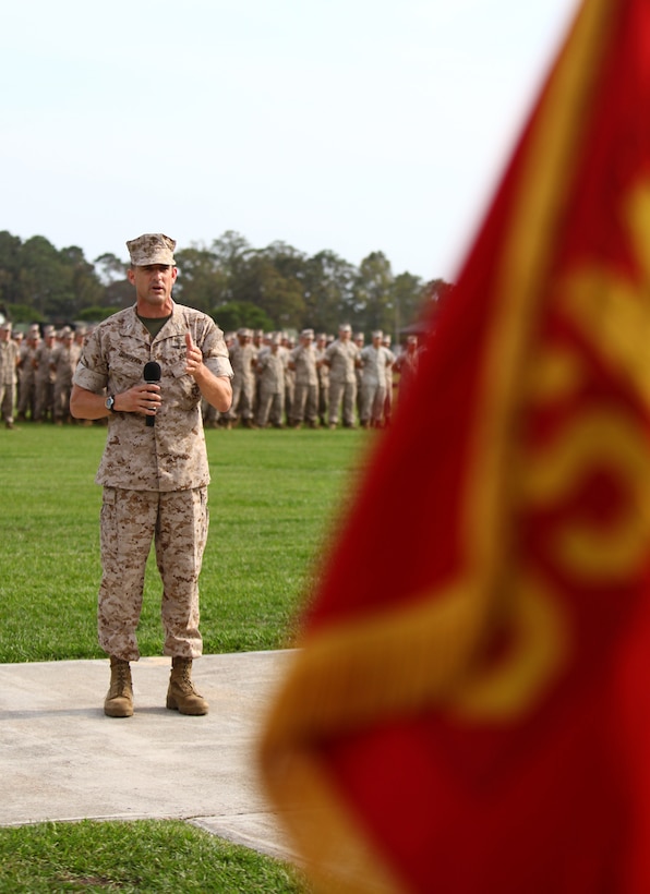 Col. Frank Donovan, the 24th Marine Expeditionary Unit's commanding officer, speaks to all in attendance during the MEU's activation ceremony at W.P.T. Hill Field, Camp Lejeune, N.C., Sept. 29. The ceremony served as an opportunity for Donovan to address the Marines and sailors of his command and their families. The ceremony was held to officially composite the 24th MEU with its subordinate units Marine Medium Tiltrotor Squadron 261, Battalion Landing Team 1st Battalion, 2nd Marine Regiment, and Combat Logistics Battalion 24.