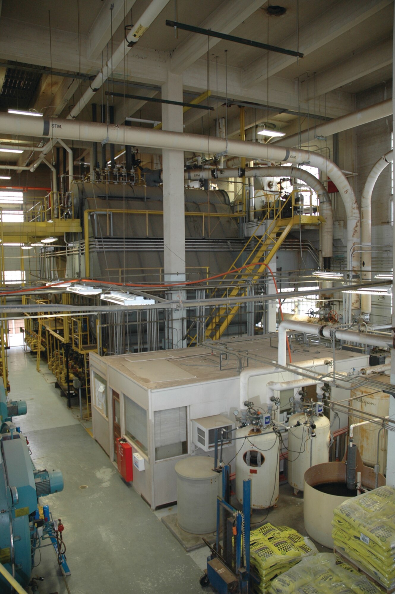 The Air Force is developing a plan to install small, more efficient boilers in individual buildings to replace this large centralized heat plant at Tinker AFB, Okla. The project could reduce natural gas 40 percent and save up to $7 million. (U.S. Air Force photo/Bill Dalke)