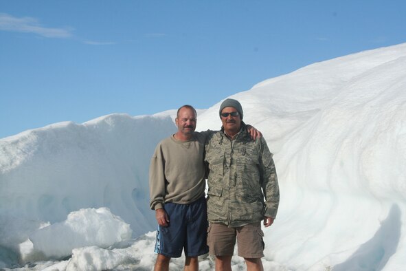 Airmen of the 166th Civil Engineer Squadron, Del. Air National Guard at Canadian Forces Station Alert July 30, 2011 on a two-week training mission. Master Sgt. Paul Duca and Chief Master Sgt. Ron Marandola enjoy some Arctic downtime. Chief Marandola, superintendent of the 166th CES, has deployed with his unit around the world for four decades, and served alongside his fellow members on their arctic mission before his retirement later this year. CFS Alert, on the northeastern tip of Ellesmere Island in the Canadian Arctic Archipelago, is the northernmost permanently inhabited place nearest the North Pole, 817 kilometers (508 miles) away. The 166th CES Prime Base Engineer Emergency Force personnel deploy anywhere in the world. (U.S. Air Force photo/Staff Sgt. Jessica Griffith)