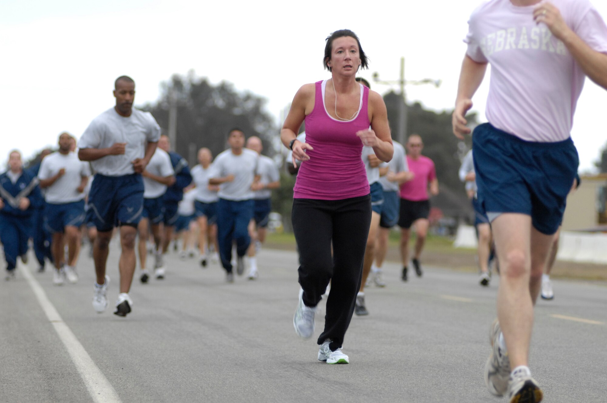 VANDENBERG AIR FORCE BASE, Calif. – Members of Team V wear pink shirts in support of Breast Cancer Awareness month during the wing run here Friday, Sept. 30, 2011. The base supports Breast Cancer Awareness month with events, displays and educational opportunities throughout the month of October. (U.S. Air Force photo/Senior Airman Lael Huss)