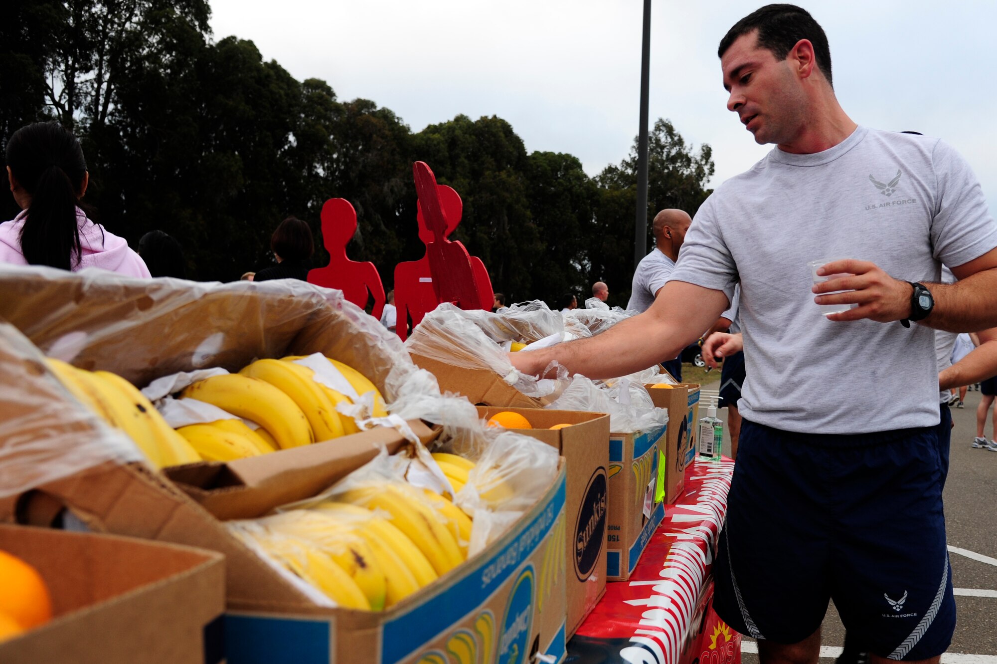 VANDENBERG AIR FORCE BASE, Calif. –  Bananas and Oranges were made available after this month’s wing run to aid in promoting awareness for breast cancer and domestic violence here Friday, Sept. 30, 2011. Team V was encouraged to wear pink or purple shirts during this month’s wing run in support of Breast Cancer and Domestic Violence Awareness month. (U.S. Air Force photo/Senior Airman Lael Huss)