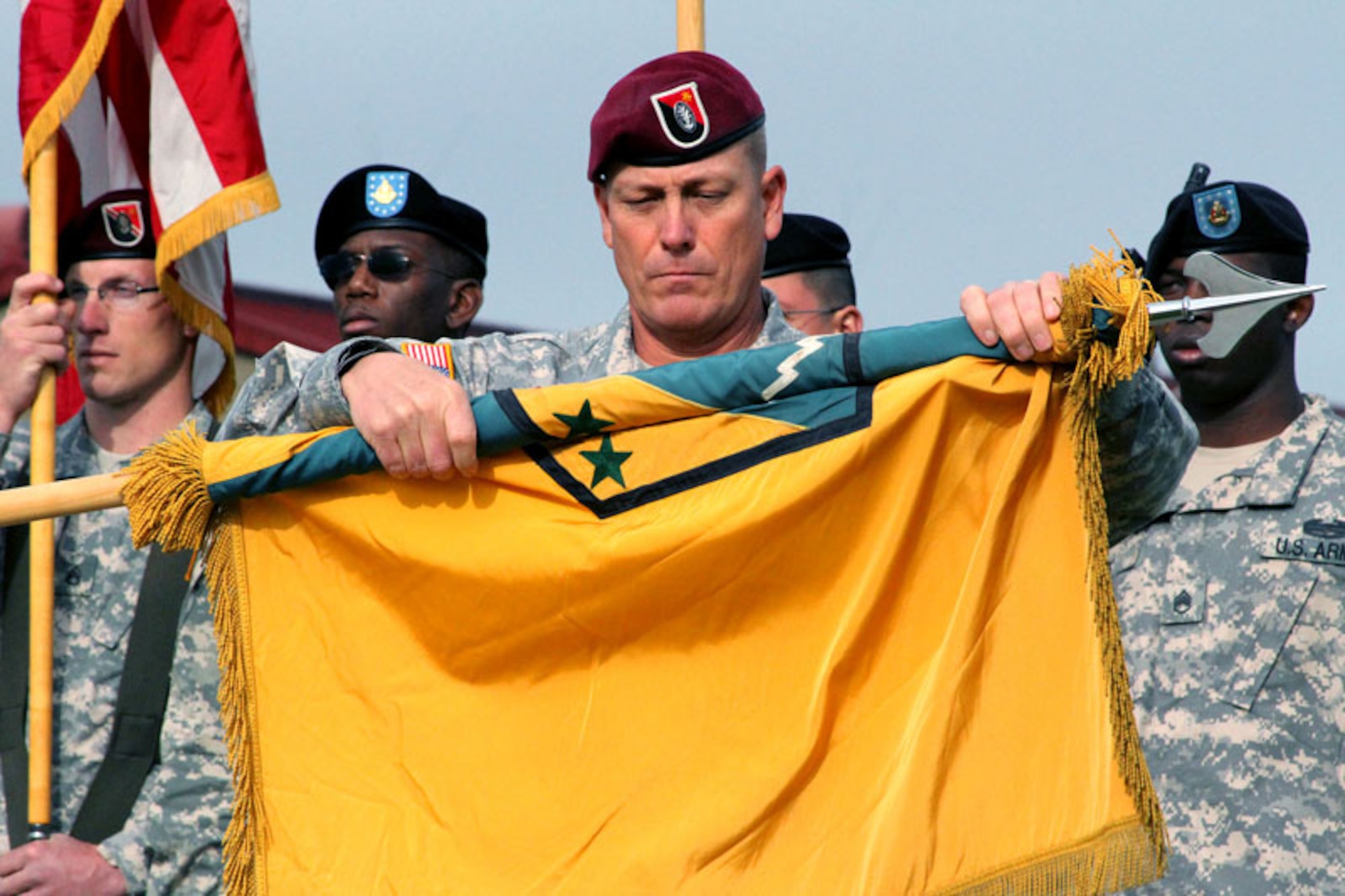 Command Sgt. Maj. James Dickens of the 2nd Engineer Brigade, furls the 3rd Maneuver Enhancement Brigade’s colors, signaling the 3rd MEB’s inactivation Sept. 21 at Joint Base Elmendorf-Richardson. (U.S. Army photo/2nd Engineer Brigade Public Affairs)