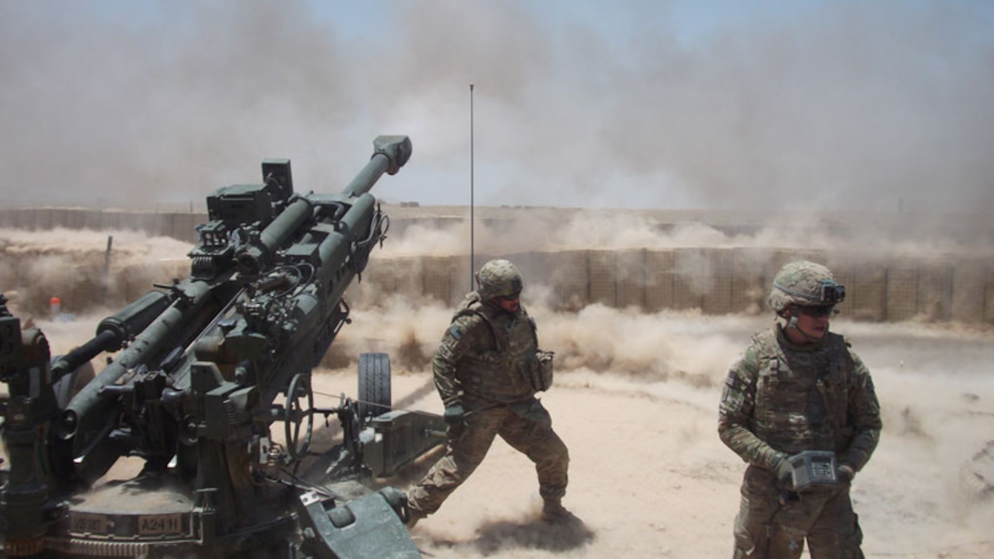 Soldiers of  A Battery, 2nd Battalion, 8th Field Artillery Regiment, 1st  Stryker Brigade Combat Team, 25th Infantry Division, fire an M777 155-mm howitzer during calibration for combat operations at Forward Operating Base Wolverine, June 12. The Fort Wainwright based brigade deployed to Afghanistan in April. (U.S. Army photo/2nd Lt. Brandon Cox)