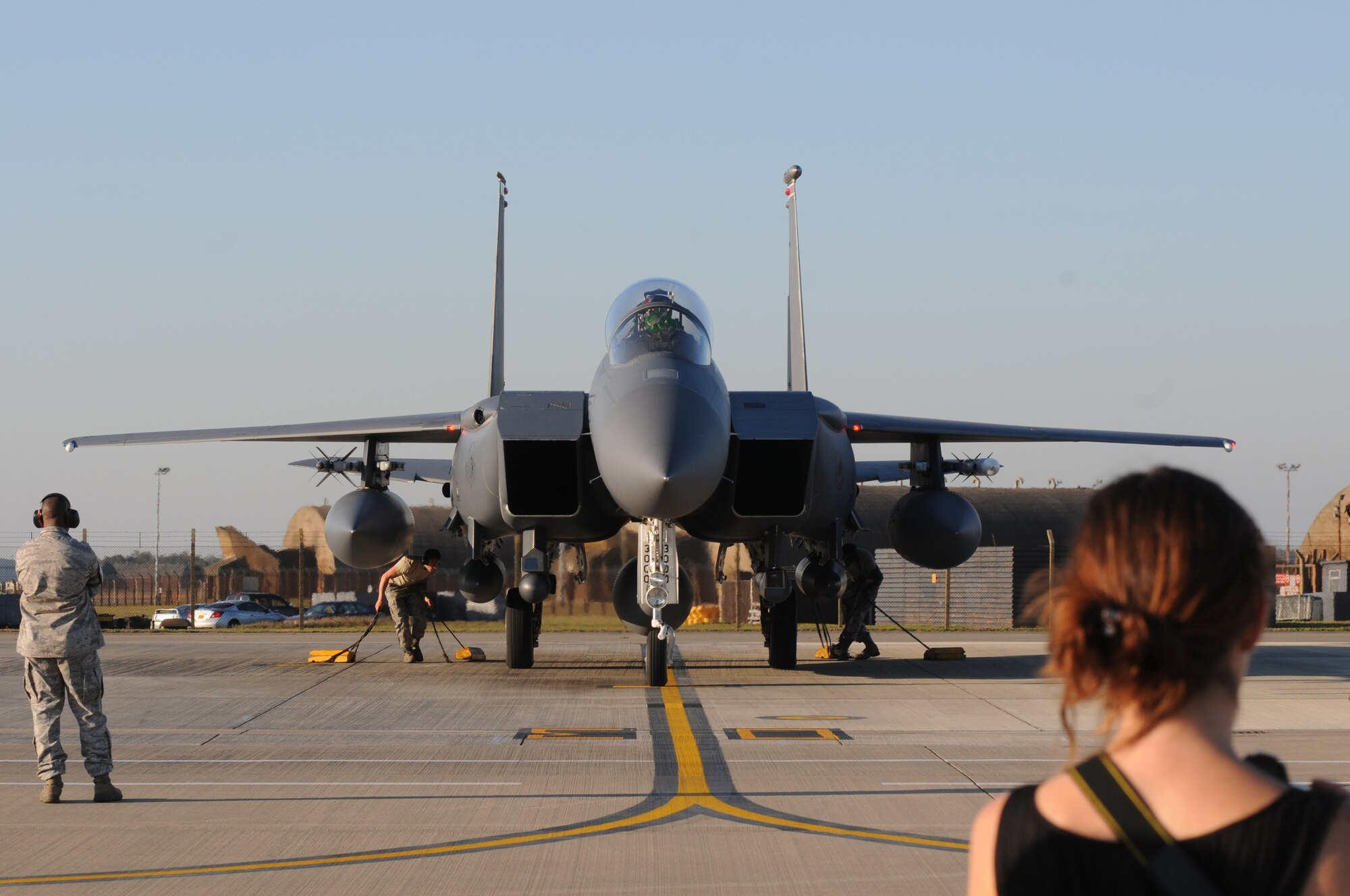 ROYAL AIR FORCE LAKENHEATH, England - Members of the 48th Fighter Wing and families eagerly await the arrival of deployment returnees Sept. 29, 2011. Airmen from the 494th Fighter Squadron returned from deployment to Kunsan Air Base, South Korea where they supported the 8th FW?s mission. 
(U.S. Air Force photo by Airman Cory D. Payne)
