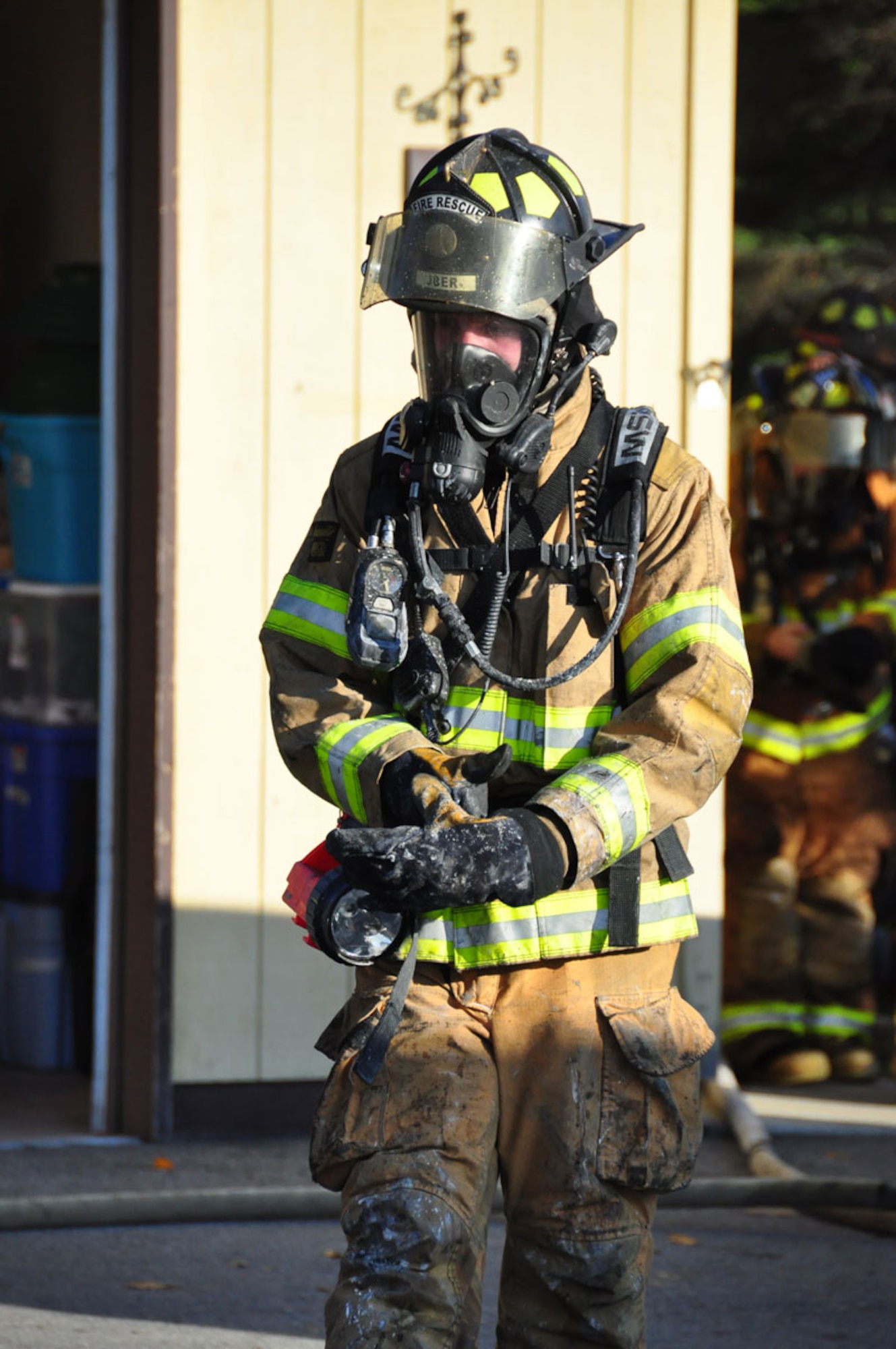The Joint Base Elmendorf-Richardson Firefighters respond to a fire in base housing, Alaska, Sept. 28, 2011. Twenty-nine firefighters fought the blazes for more than four hours.  (U.S. Air Force photo by Maj. Joseph Coslett)