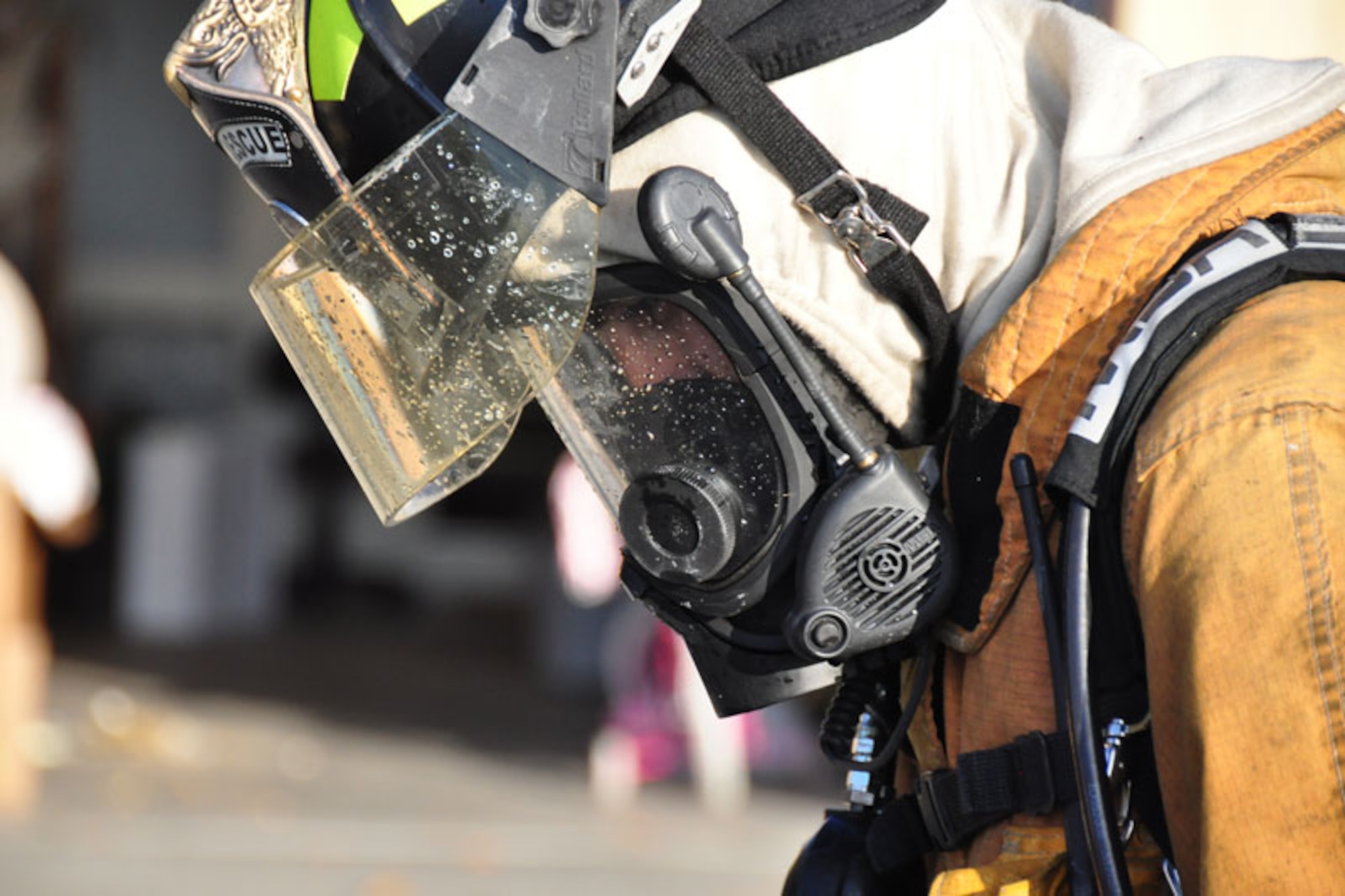 A Joint Base Elmendorf-Richardson firefighter takes a breather during a four-hour response to a fire in base housing, Wednesday. National Fire Prevention Week, which promotes fire prevention and safety, is Oct. 9 to 15.  (U.S. Air Force photos/Maj. Joseph Coslett)