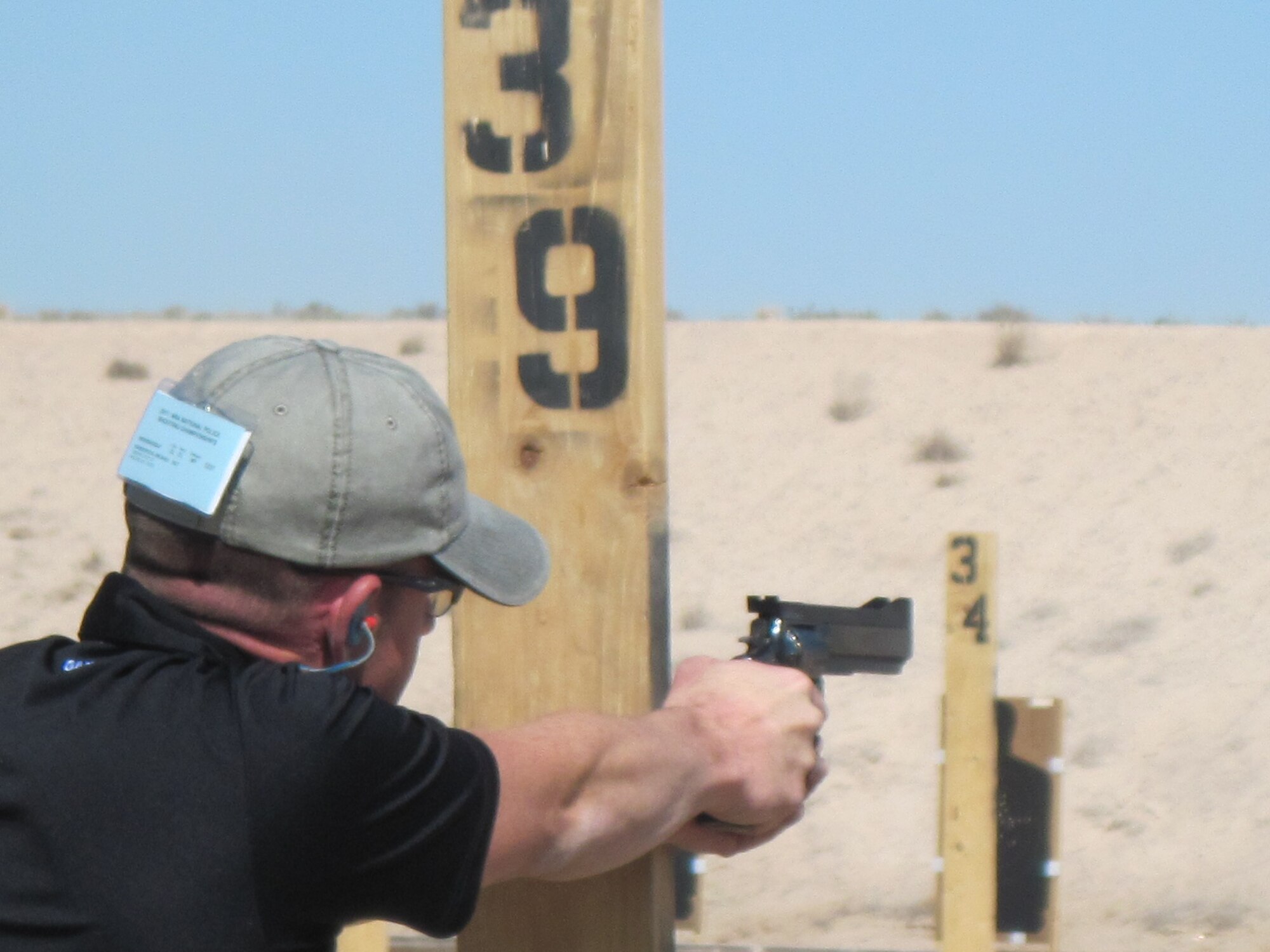 Michael Henderson zeroes in on his target during the National Rifle Association’s National Police Shooting Championship, which was held Sept. 17-22 in Albuquerque, N.M. The technical sergeant with the 72nd Security Forces Squadron fired his way to his fourth consecutive win. (Courtesy photo)