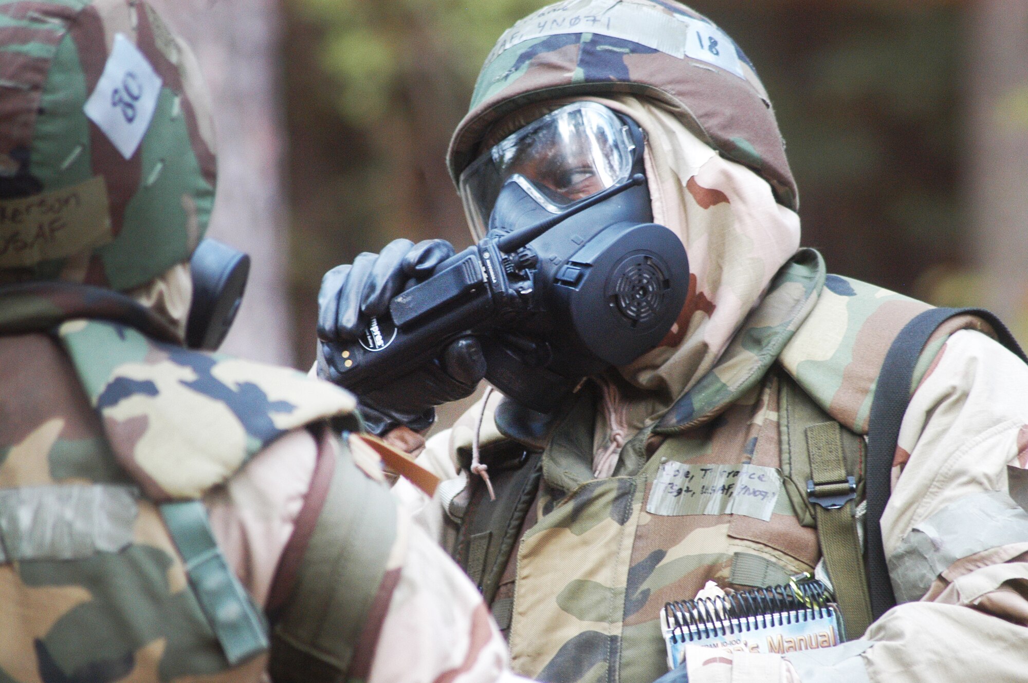 Airmen perform a PAR ( Post Attack Reconnaissance)  during exercises Sept 21 at Warrior Air Base. U. S. Air Force photo by Sue Sapp