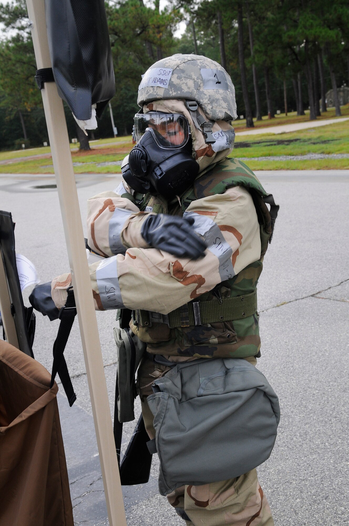 An Airman goes through the motions of the de-contamination process during exercise training. U. S. Air Force photo by Sue Sapp