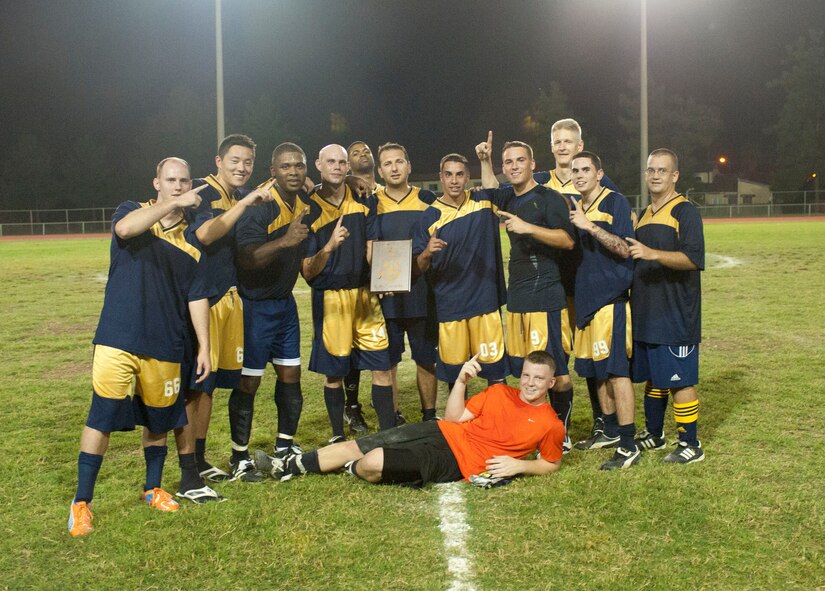 The 728th Air Mobility Squadron soccer team poses after the intramural soccer championship game Sept. 29, 2011, at Incirlik Air Base, Turkey. The 728th AMS won against the 39th Security Forces Squadron 3-1. (U.S. Air Force photo by Senior Airman Clayton Lenhardt/Released)