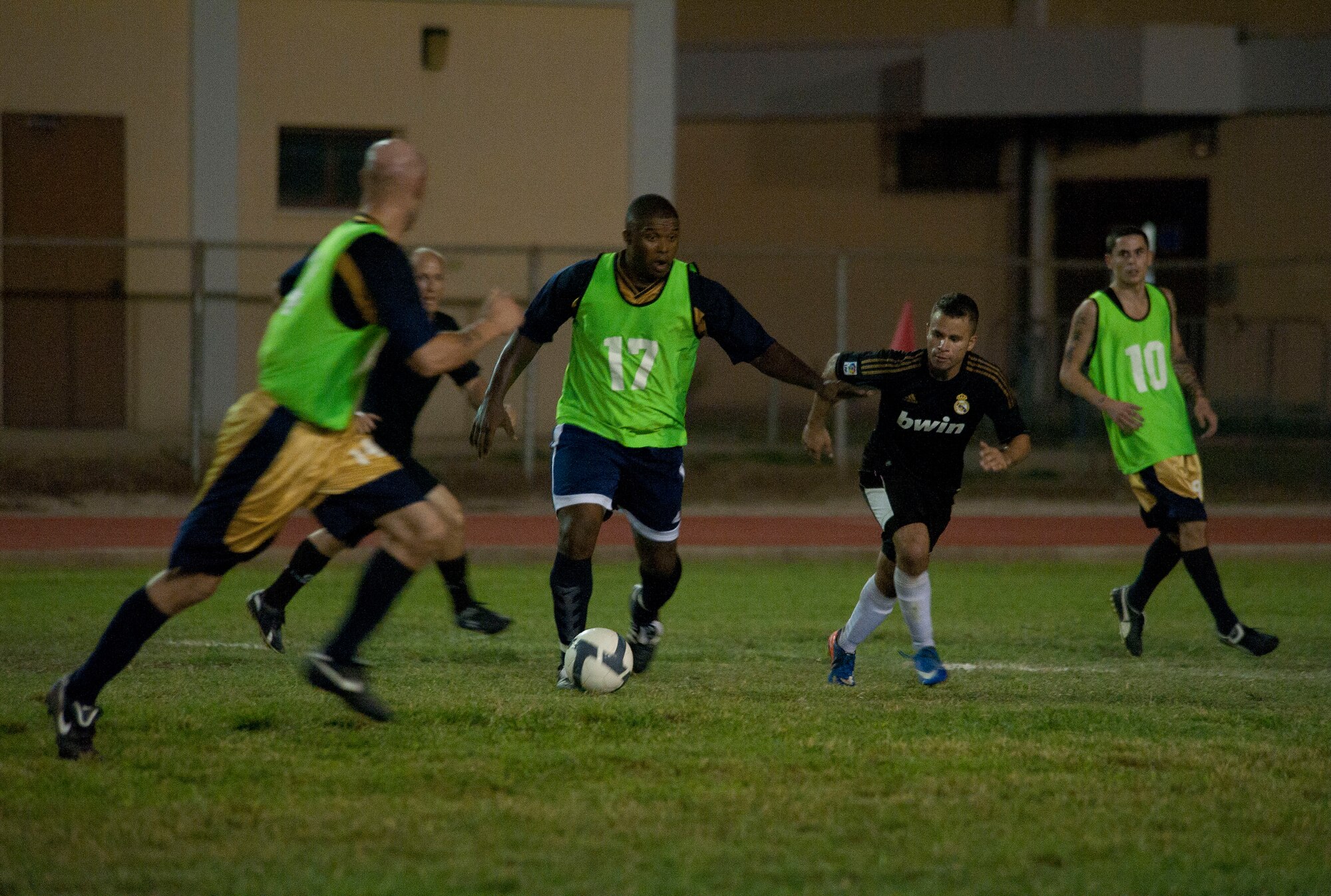 Winston Jones, 728th Air Mobility Squadron, dribbles the ball downfield during the intramural soccer championship game Sept. 29, 2011, at Incirlik Air Base, Turkey. The 728th AMS won against the 39th Security Forces Squadron 3-1. (U.S. Air Force photo by Senior Airman Clayton Lenhardt/Released)