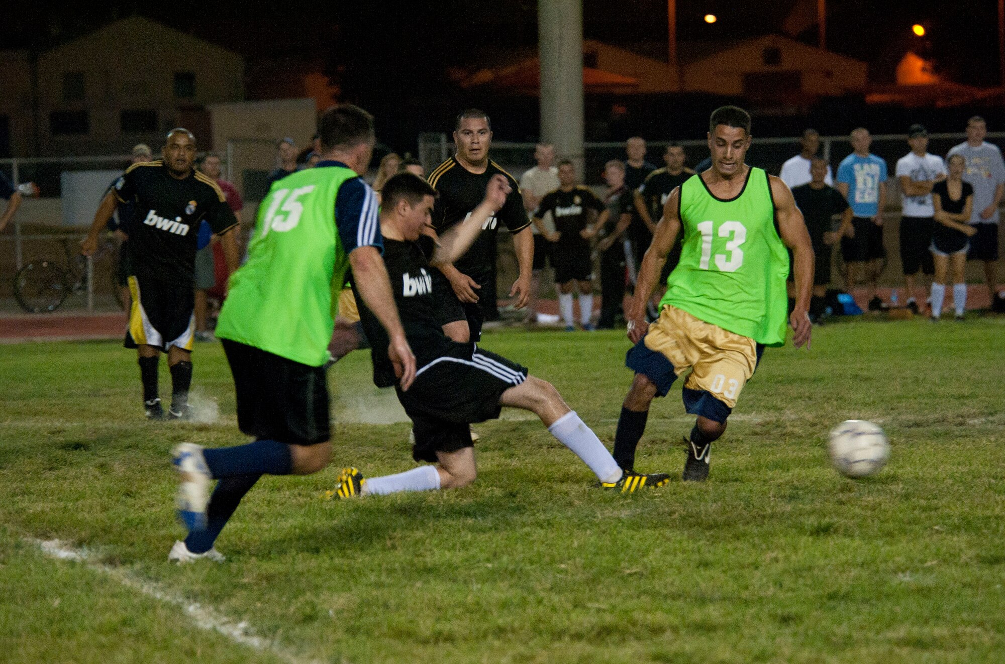 Players of the 728th Air Mobility Squadron and 39th Security Forces Squadron fight for control of the ball during the intramural soccer championship game Sept. 29, 2011, at Incirlik Air Base, Turkey. AMS won against SFS 3-1. (U.S. Air Force photo by Senior Airman Clayton Lenhardt/Released)