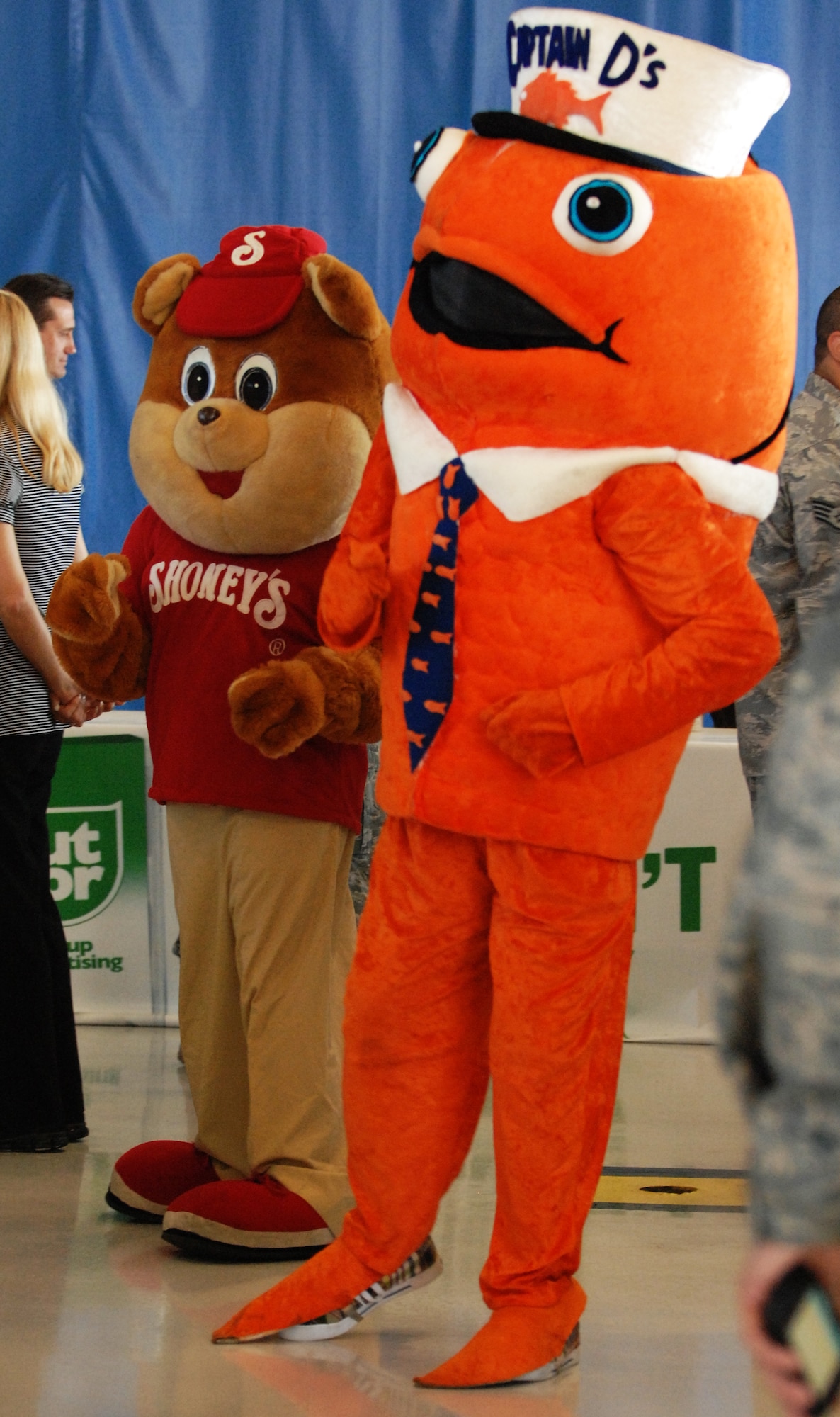 Mascots for local restaurants dance during the Military Appreciation Picnic, Shaw Air Force Base, S.C., Sept. 29, 2011. It was the third annual picnic organized by the Sumter Chamber of Commerce's military affairs committee. Approximately 200 volunteers participated in the event. (U.S. Air Force photo by Airman 1st Class Tabatha Duarte/Released)