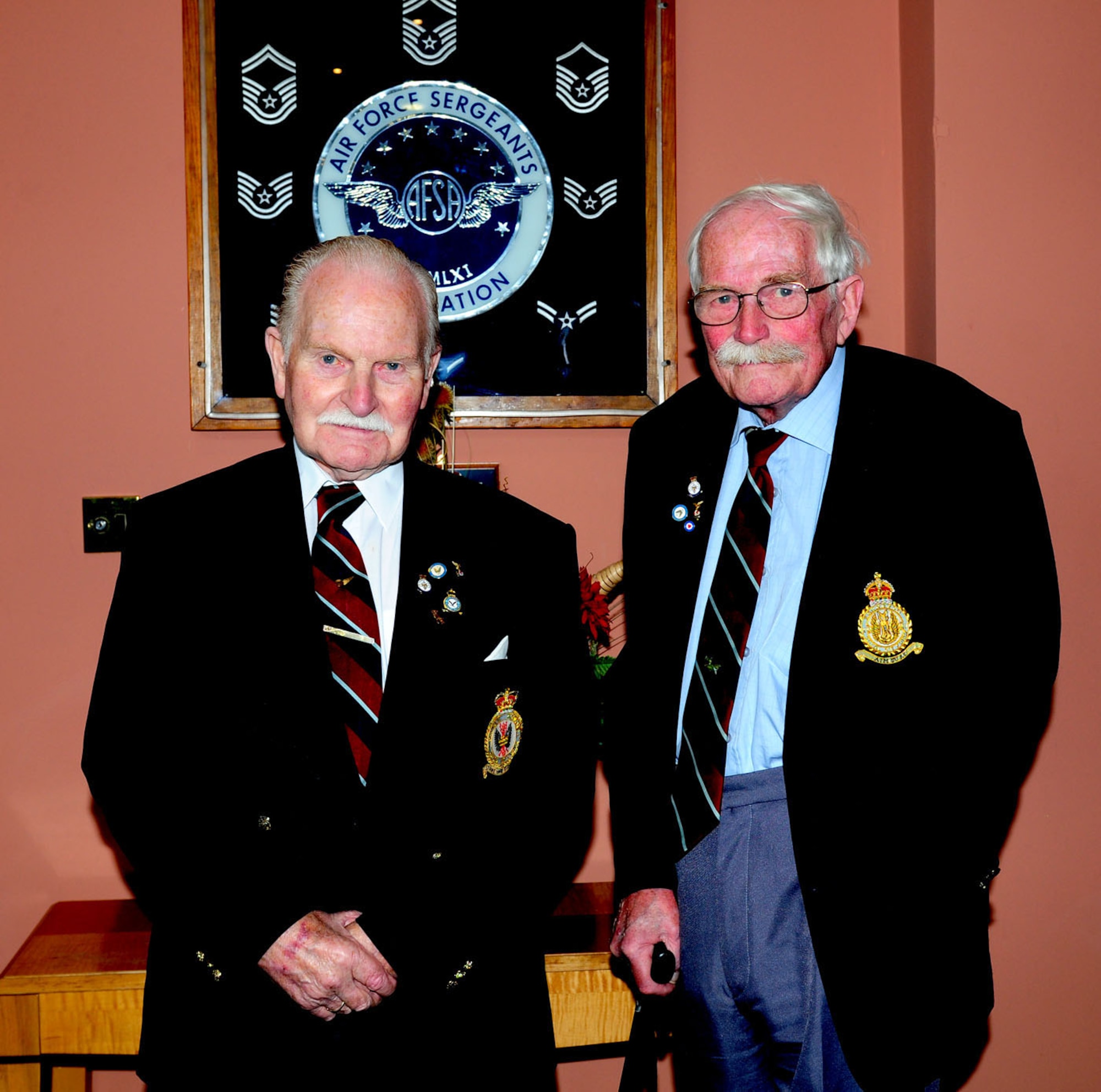 RAF MILDENHALL, England -- Jim Gooding, left, a former rear gunner on Lancaster bombers, stationed here during 1945, and Stan Franks, a former flight engineer and second pilot, stationed at RAF Mildenhall from 1943 to 1945, visited for the first time in 66 years Sept. 14, 2011. The World War II veterans visited the base and were shown around by military members currently stationed here. (U.S. Air Force photo by Karen Abeyasekere)
