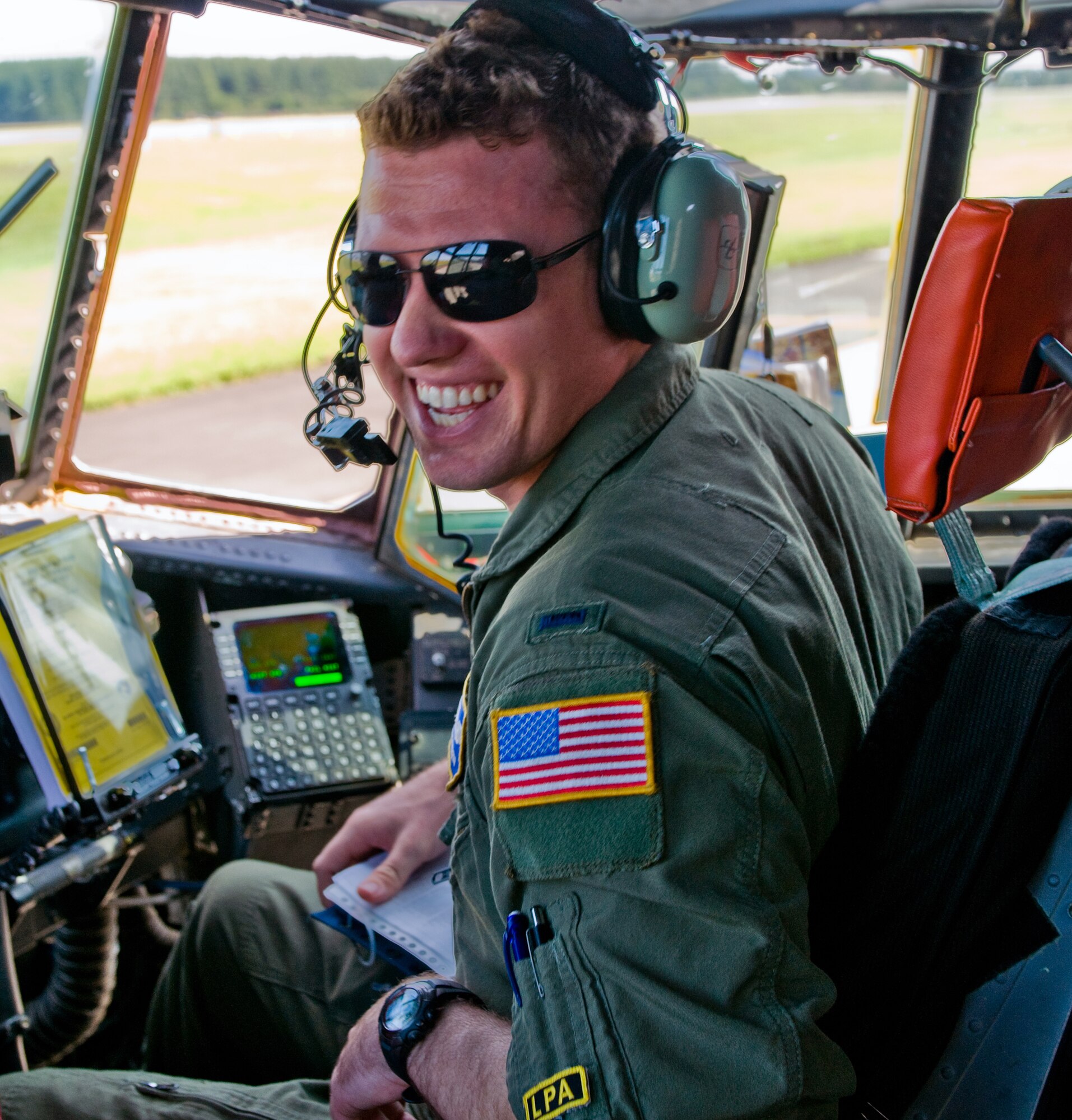 YOKOTA AIR BASE, Japan -- 1st Lt. Evan Dineen, 36th Airlift Squadron pilot, smiles for a photo before preparing for a flight at Yokota Air Base, Japan, Sept. 27, 2011. Dineen is a native of Laguna Beach, Calif. (U.S. Air Force photo/Airman 1st Class Krystal M. Garrett)  
