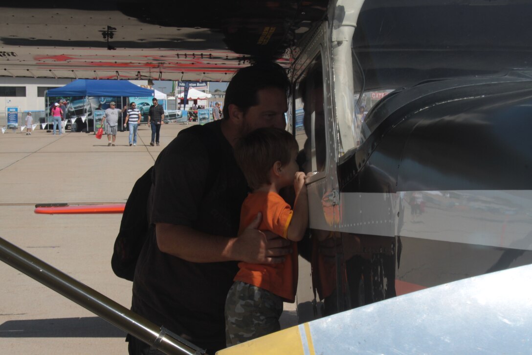Families toured more than 100 static aircraft and vehicles displays provided by military and civilian sources at the Marine Corps Air Station Miramar Air Show aboard MCAS Miramar Sept. 30. This year's show was themed, "A Salute to San Diego: Birthplace of Naval Aviation 1911-2011."