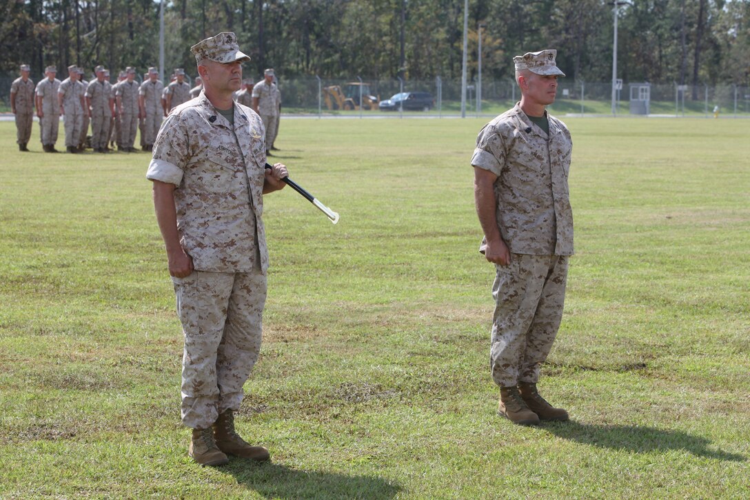 Sgt. Maj. Richard W. Ashton (left), former sergeant major of U.S. Marine Corps Forces, Special Operations Command, stands beside oncoming Sgt. Maj. Thomas F. Hall during a post and relief ceremony aboard Camp Lejeune, N.C. Sept. 30. As Hall prepares to take the reins as MARSOC's top senior-enlisted, Ashton is retiring after 32 years of service.