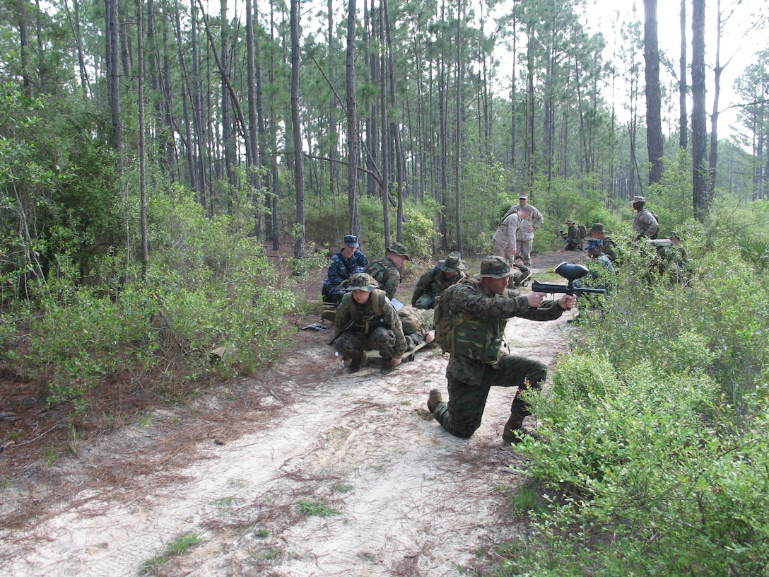 The Marines of MATSG-42 execute a simulated casualty evacuation during a drill weekend at NAS Pensacola, Fla., March 31-April 1, 2012