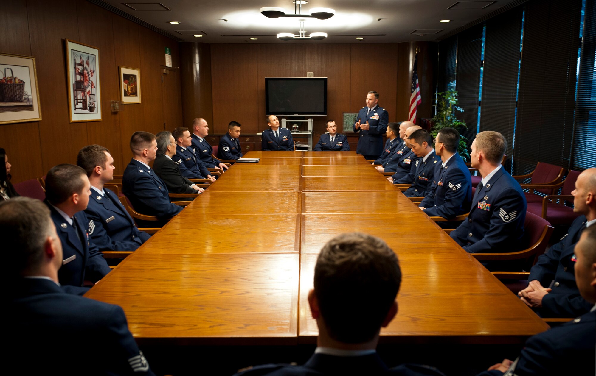 TOKYO -- Maj. Destry Hill, 374th Operations Group, talks to U.S. Secretary of Energy, Dr. Steven Chu, at the U.S. Embassy in Tokyo on March 30, 2012. Chu visited Tokyo and asked to speak with the Airmen involved in working with the Department of Energy during Operation Tomodachi, the recovery effort following the great Tohoku Earthquake and Tsunami March 11, 2011. (U.S. Air Force photo/Staff Sgt. Samuel Morse)