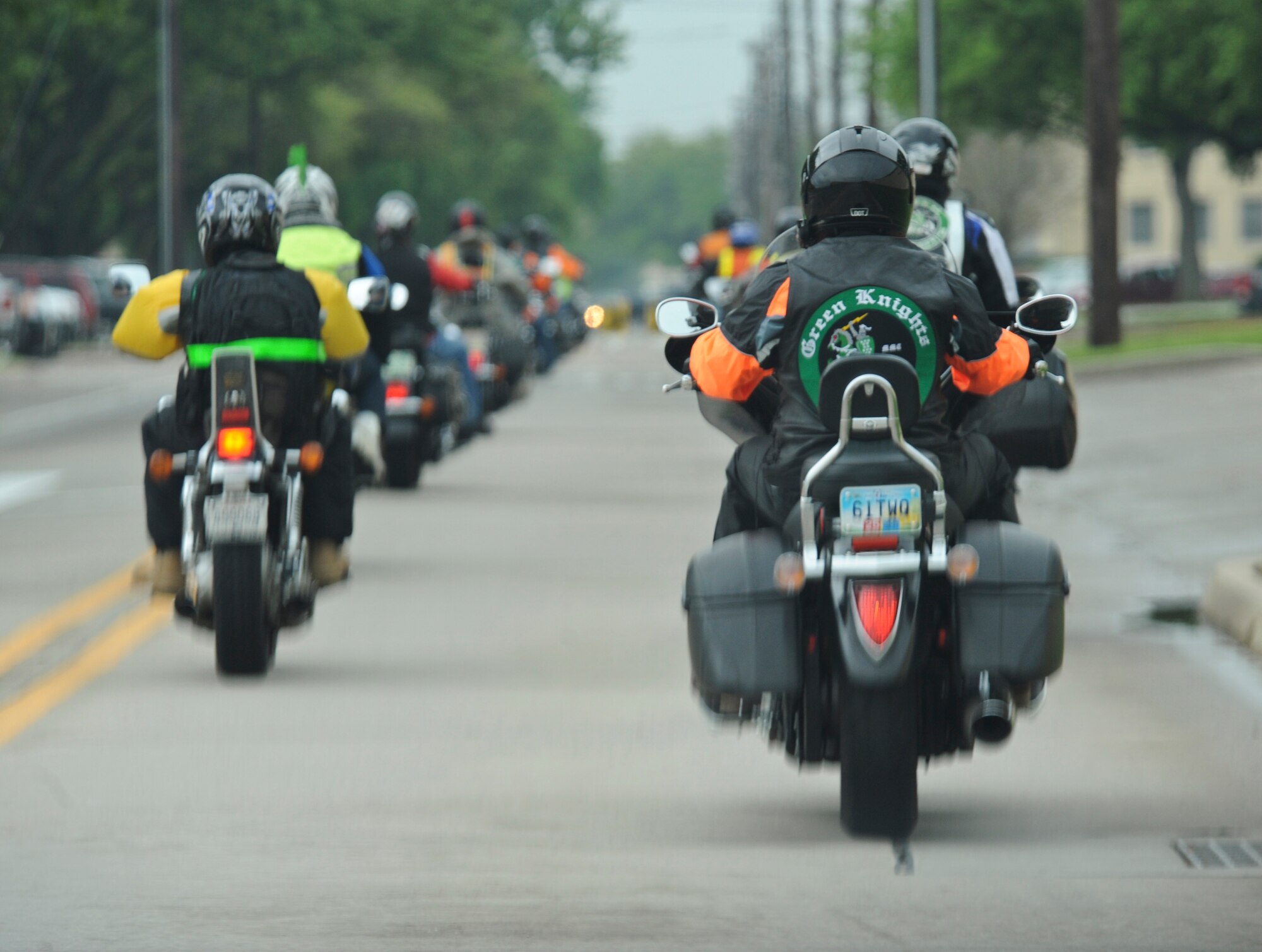 Motorcycle enthusiasts, participating in Thunder on the Bayou, cruise passed the 8th Air Force Museum on Barksdale Air Force Base, La., March 30. After the 50-mile ride, enthusiasts met up at the 2nd Maintenance Squadron Accessories flight hangar for raffles, food, games and a bike show. (U.S. Air Force photo/Airman 1st Class Micaiah Anthony)(RELEASED) 