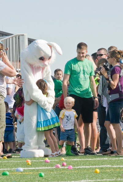 Airman 1st Class Davis Mytchal, Easter bunny, hugs a child March 31, 2012 during an Easter egg hunt, at Dyess Air Force Base, Texas. The youth center supported the annual event by collecting 3,000 eggs and laying them out for different the participants. (U.S. Air Force photo by Airman 1st Class Jonathan Stefanko/ Released)