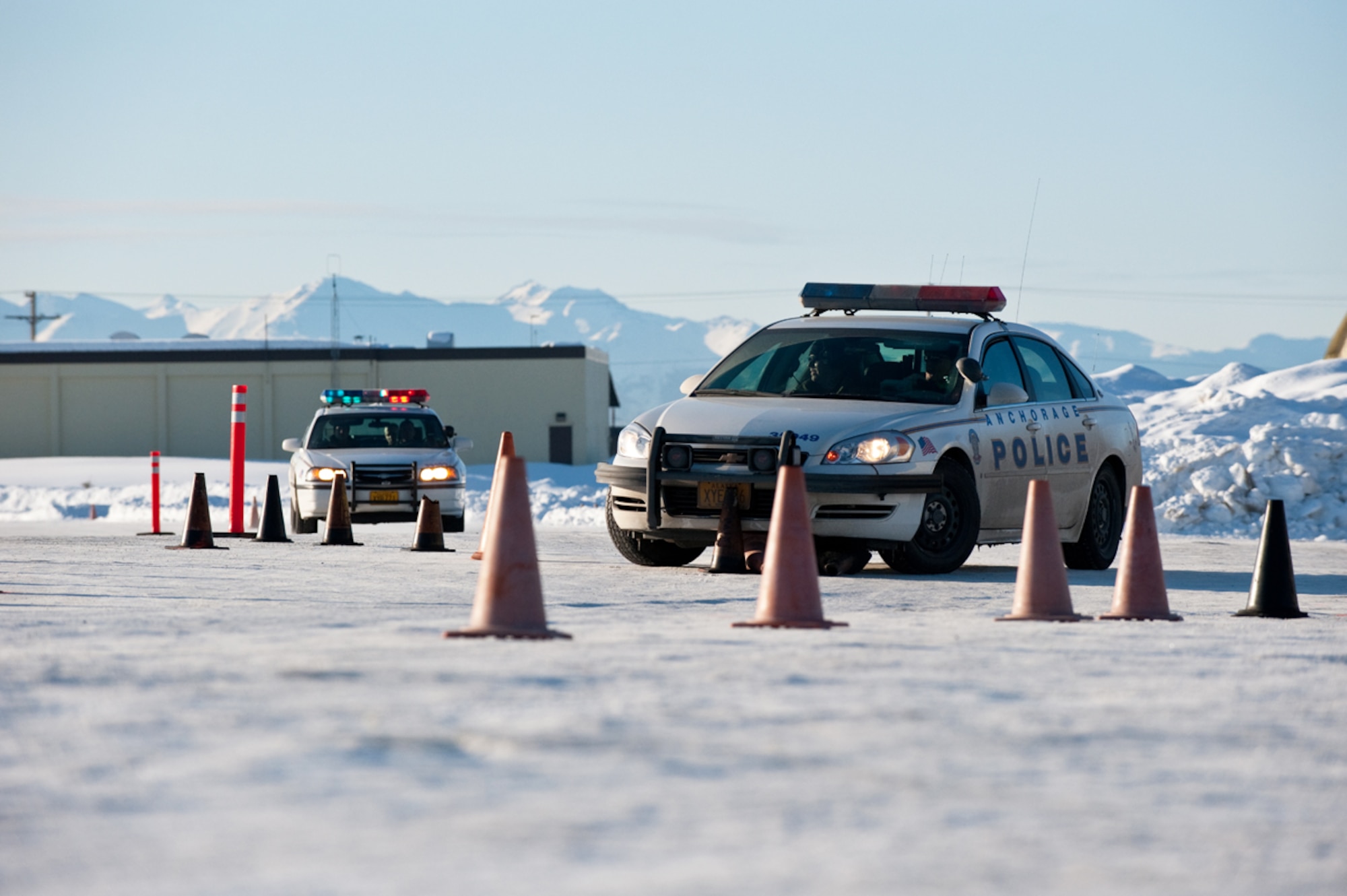 JOINT BASE ELMENDORF-RICHARDSON, Alaska - - New Police Academy recruits practice winter driving techniques, March 22. Joint Base Elmendorf-Richardson has hosted the Anchorage Police Department???s Emergency Vehicle Operations Course for the last 20 years. (U.S. Air Force photo/Johnathon Green)