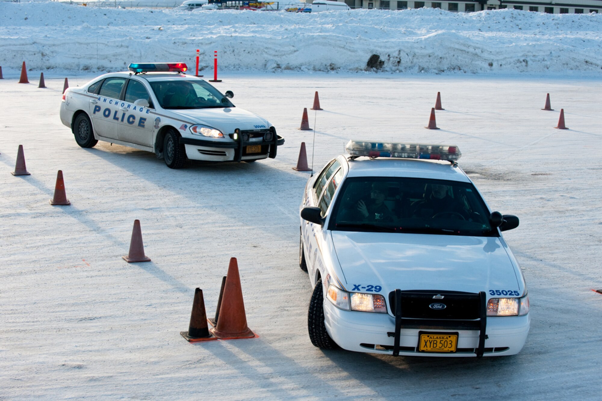 JOINT BASE ELMENDORF-RICHARDSON, Alaska - - New Police Academy recruits practice winter driving techniques, March 22. Joint Base Elmendorf-Richardson has hosted the Anchorage Police Department???s Emergency Vehicle Operations Course for the last 20 years. (U.S. Air Force photo/Johnathon Green)