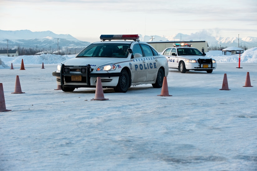 JOINT BASE ELMENDORF-RICHARDSON, Alaska - - New Police Academy recruits practice winter driving techniques, March 22. Joint Base Elmendorf-Richardson has hosted the Anchorage Police Department???s Emergency Vehicle Operations Course for the last 20 years. (U.S. Air Force photo/Johnathon Green)