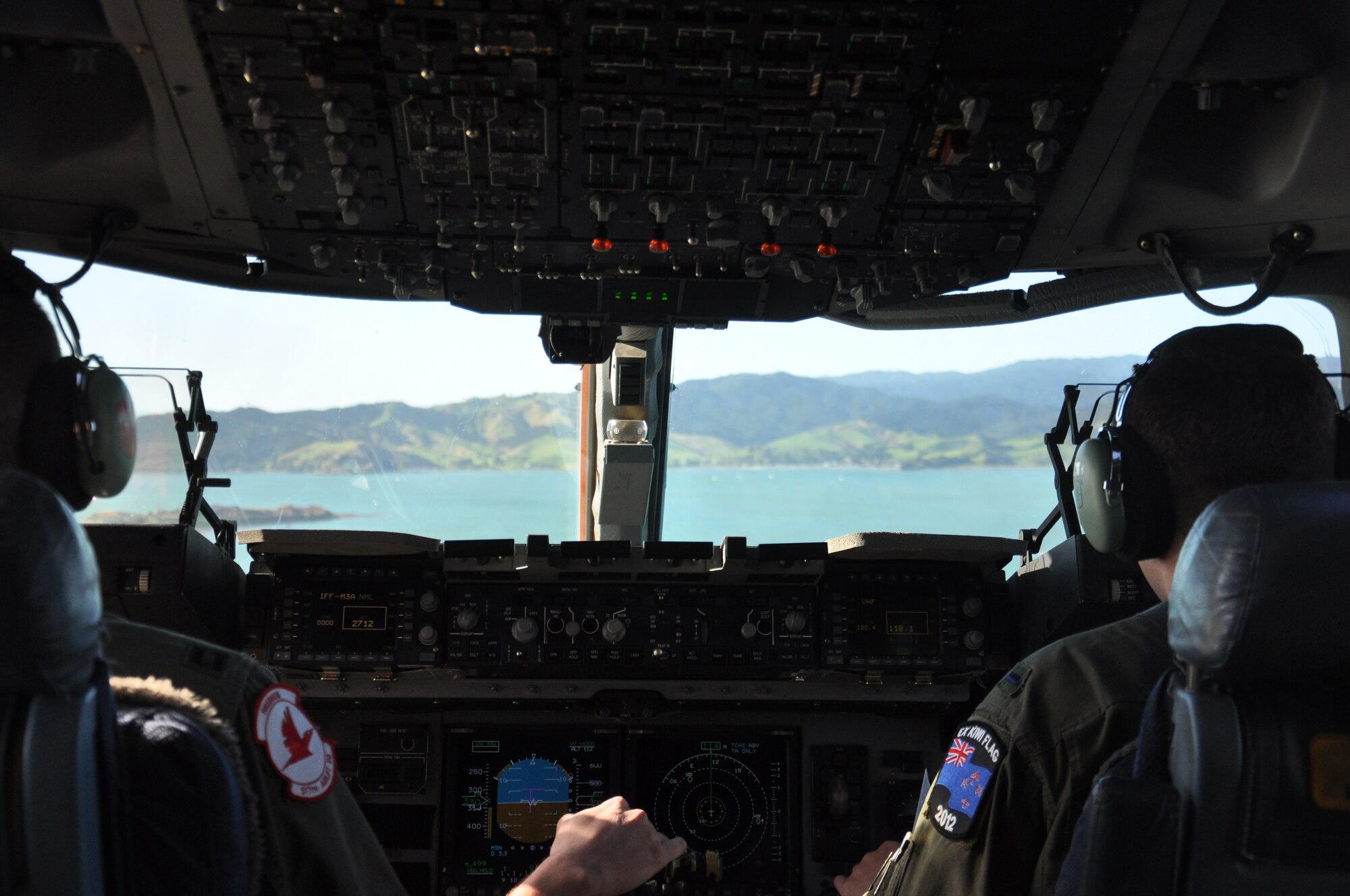 Capt Derek Dupois and 1st Lt Chris Sczabolcs, assigned to the 517th Airlift Squadron, Joint Base Elmendorf-Richardson, Alaska, execute a low-level training mission over the north island of New Zealand during Exercise Kiwi Flag.  Exercise Kiwi Flag is one of several activities the U.S. Air Force is participating in as part of the 75th anniversary of the Royal New Zealand Air Force this year. (U.S. Air Force photo by Capt. Rebecca Heyse/Released)