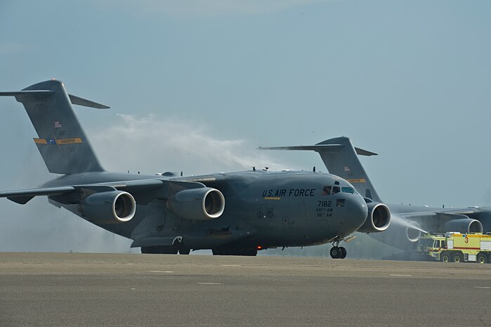 In perfect sunny weather, Col. Darren James was greeted by family and friends to celebrate his return from his "fini flight" as the 437th Airlift Wing's vice commander March 19. 

James' last flight took him and his crew on a local training mission, focusing on air refueling with a formation of two KC-135s, and then tactical training at the North Auxiliary Airfield.

During his tenure at Joint Base Charleston - Air Base, James took on the role of Crisis Action Team lead during JB Charleston's 2011 Operational Readiness Inspection. He also championed many of the strategy alignment and development efforts which included continuous process improvement efforts, ensuring Airmen are deployed combat-ready and developing stronger bonds between the base and the community. 

Due in large part to James' excellent leadership, the 437th AW was able to deliver more than 88,000 passengers and 220 million pounds of cargo to locatioins around the world. 

James will be attending pilot instructor training at Randolph Air Force Base, Texas in preparation for his assignment as 71st Flying Training Wing, commander at Vance AFB, Okla. 
