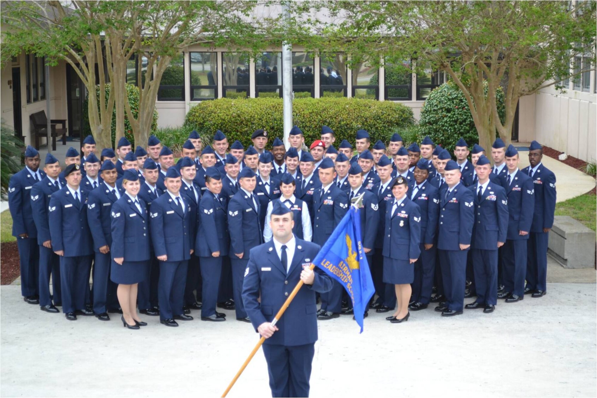 Staff sergeants and senior airmen from Class 12-C of the Vincent Airman Leadership School pose in front of the school at Hurlburt Field, Fla. The class graduated from ALS during a ceremony at the Soundside Club at Hurlburt Field, Fla., March 29, 2012. (Courtesy photo)