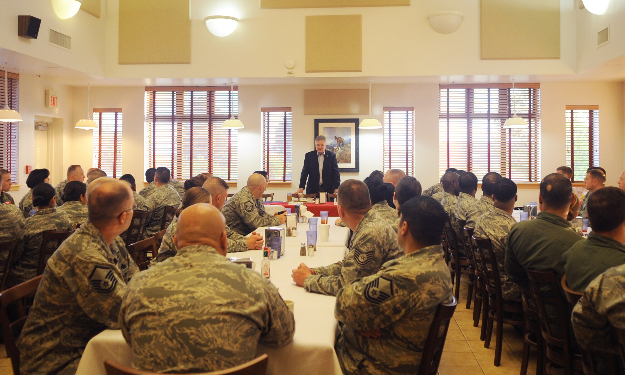 Retired Chief Master Sergeant of the Air Force Gerald Murray briefs a group of noncommissioned officers and senior NCO’s during breakfast at the Longhorn Dining Facility March 30, 2012, at Dyess Air Force Base, Texas. Murray was invited as a guest speaker for the 7th Maintenance Group Maintenance Professional of the Year Banquet. He also used his time at Dyess to visit various units on the base and meet with Airmen. (U.S. Air Force photo by Airman 1st Class Cierra Bullock/Released)