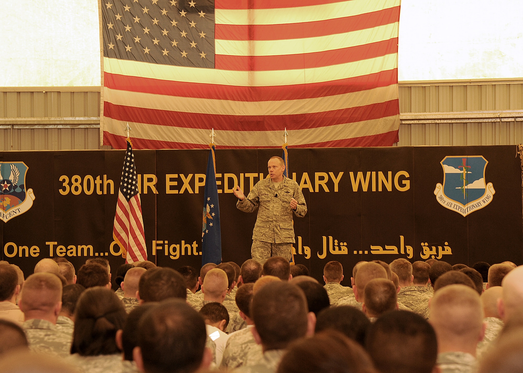 Gen. Donald Hoffman, Air Force Materiel Command commander, addresses the concerns that many Airmen from the 380th Air Expeditionary Wing have about the future of the wing, as well as the Air Force as a whole, during an All Call March 18, 2012. This stop at the 380 AEW was part of a trip through the U.S. Central Command's area of responsibility to acquire feedback directly from warfighters to determine how AFMC can better accomplish its supply and sustainment operations. (U.S. Air Force photo/Tech. Sgt. Arian Nead) 