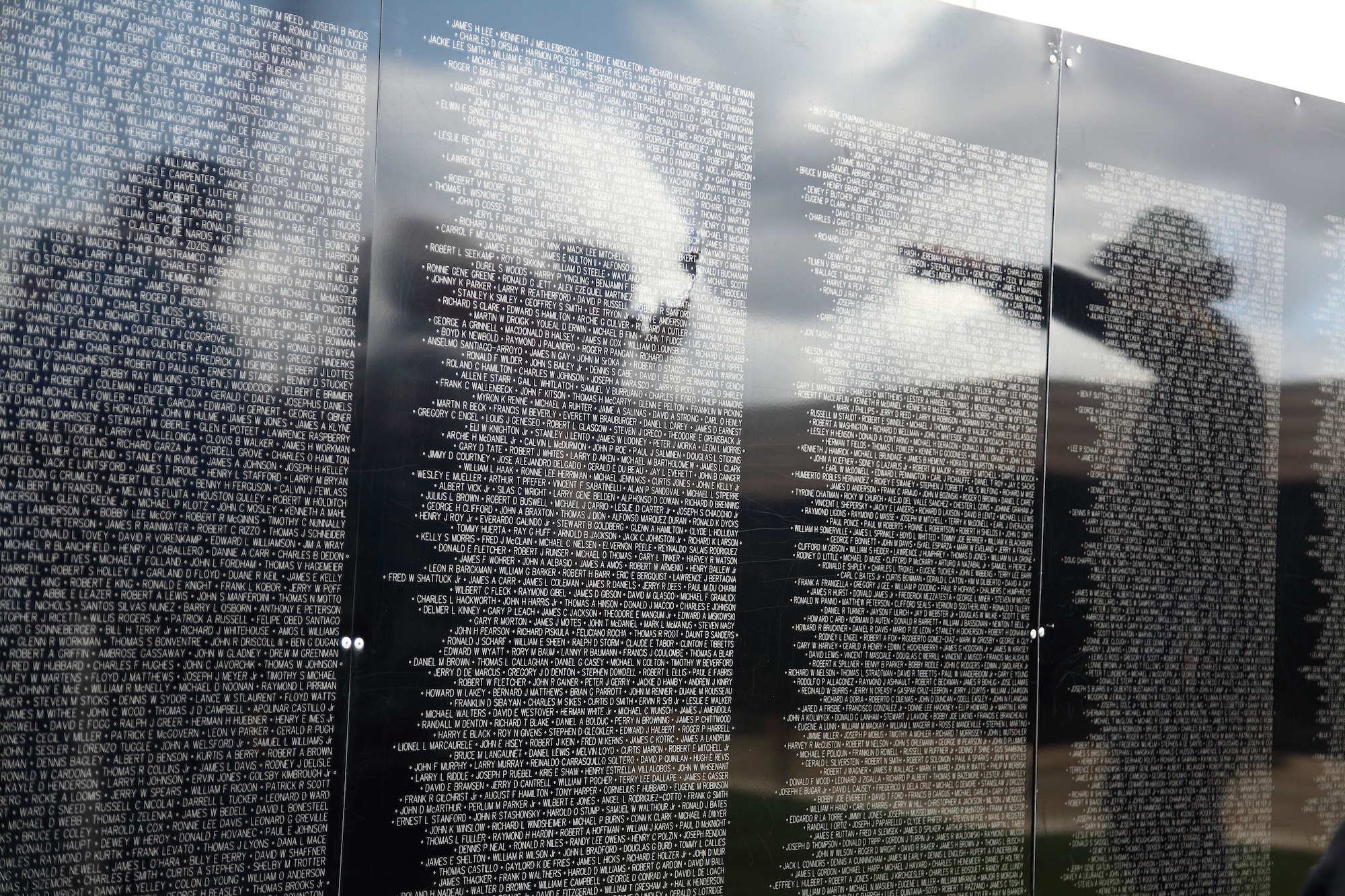 Volunteers help assemble The Wall that Heals, a traveling replica of the Vietnam Memorial Wall, at the March Field Air Museum Monday. The Wall that Heals will be on display through the weekend. (U.S. Air Force photo by Carson Hampton) 

