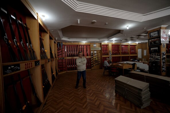 Osman Ceteci, Silver Eagle Huglu Shotgun Store sales manager, awaits customers March 29, 2012, in Incirlik Village, Turkey. The store is registered with the Incirlik Village Merchants Association, which was founded approximately 20 years ago with the objective to improve relationships with American customers. (U.S. Air Force photo by Senior Airman Jarvie Z. Wallace/Released)