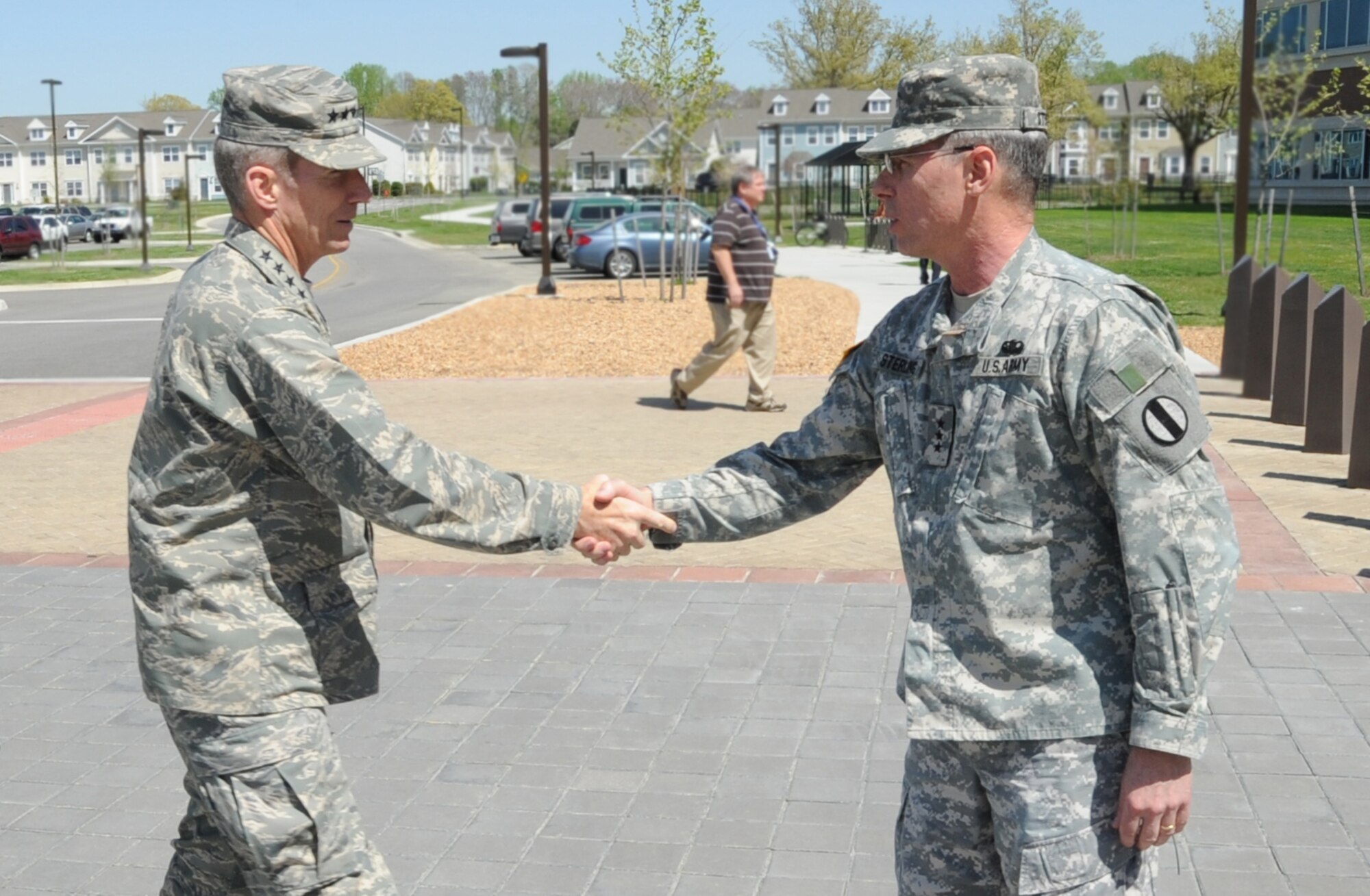 U. S. Air Force Gen. Mike Hostage, left, greets U.S. Army Lt. Gen. John Sterling, Deputy Commanding General and Chief of Staff, U.S. Army Training and Doctrine Command, at TRADOC Headquarters on Fort Eustis Mar. 29. Hostage toured TRADOC as part of his immersion at Joint Base Langley-Eustis to get an in-depth look at the mission. (U.S. Army Photo by Staff Sgt. Steven Schneider/Released)