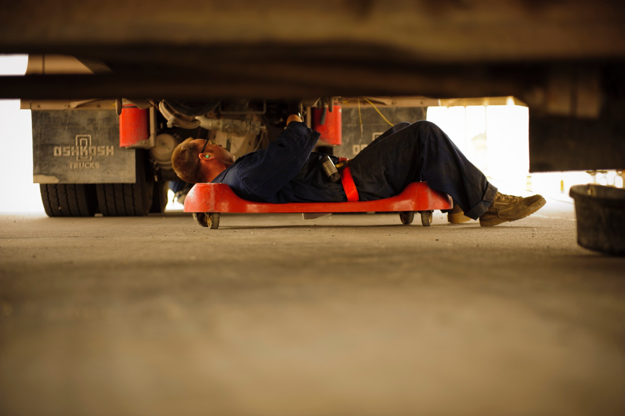 SOUTHWEST ASIA – Staff Sgt. Joseph Ridenour, 379th Expeditionary Logistics Readiness Squadron refueling maintenance technician, bleeds an air valve on a fuel truck March 30, 2012. Bleeding the valves makes sure the fuel lines don’t get clogged or corroded. (U.S. Air Force photo/Staff Sgt. Nathanael Callon)