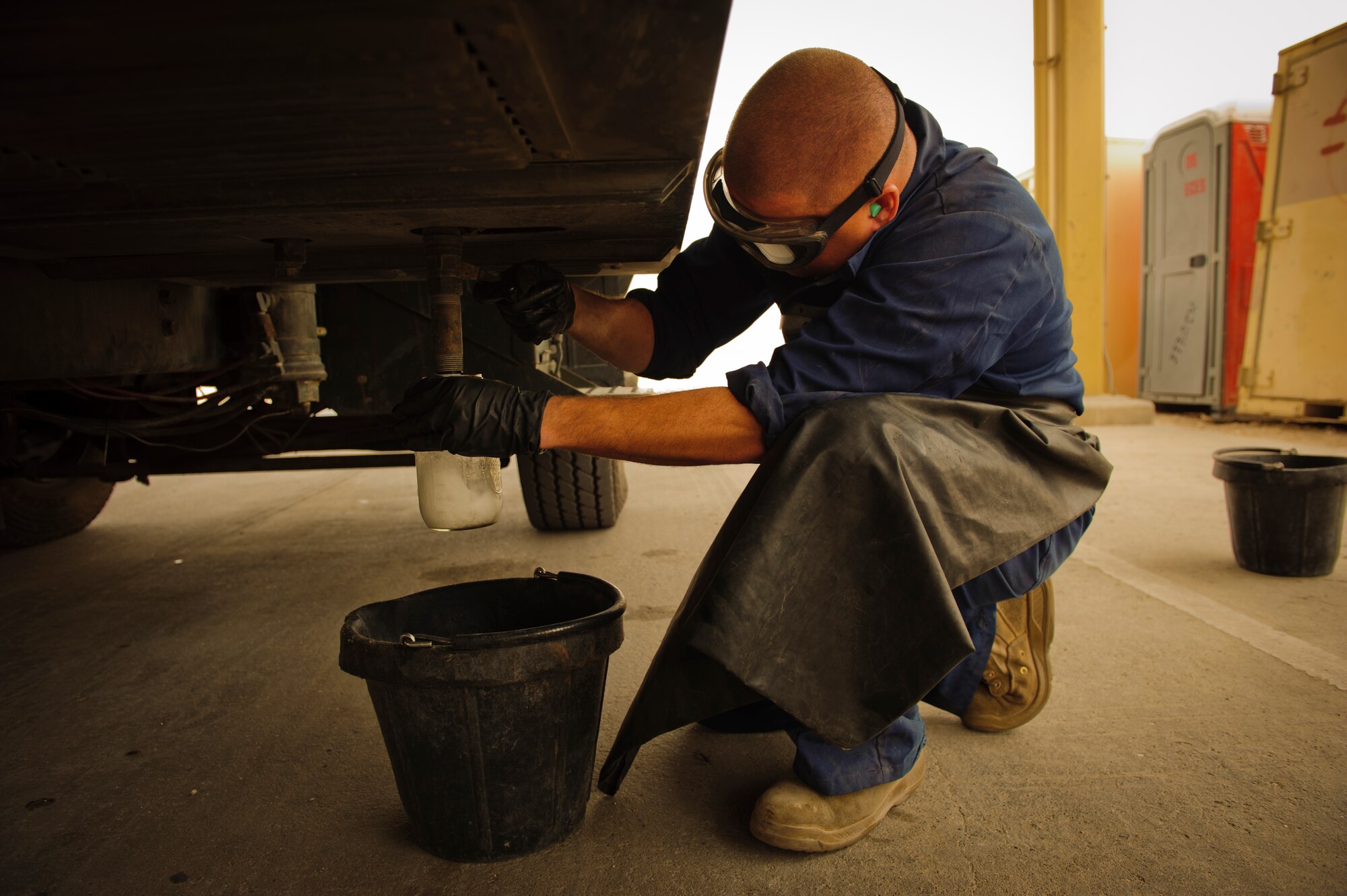 SOUTHWEST ASIA – Staff Sgt. Daniel Zickefoose, 379th Expeditionary Logistics Readiness Squadron refueling maintenance technician, checks fuel for water and sediment March 30, 2012. If the fuel has water or sediment in it, it indicates that the fuel could be contaminated, meaning it cannot be loaded into aircraft on base. (U.S. Air Force photo/Staff Sgt. Nathanael Callon)