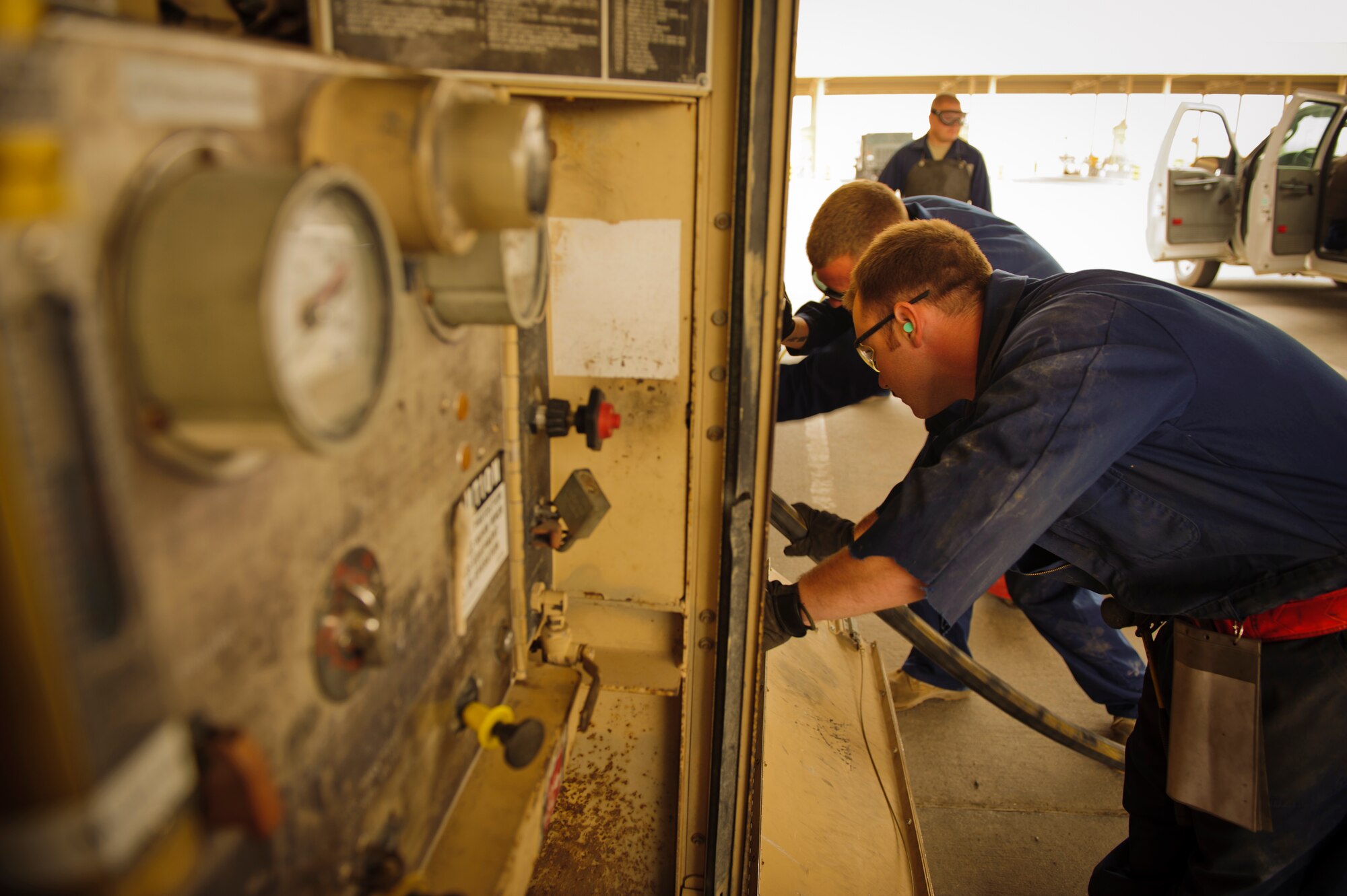 SOUTHWEST ASIA – Staff Sgt. Joseph Ridenour, 379th Expeditionary Logistics Readiness Squadron refueling maintenance technician, checks a hose for leaks during an inspection on a fuel truck here March 30, 2012. The refueling maintenance team inspects refueling units every morning, ensuring they are operationally ready to refuel aircraft. (U.S. Air Force photo/Staff Sgt. Nathanael Callon) 