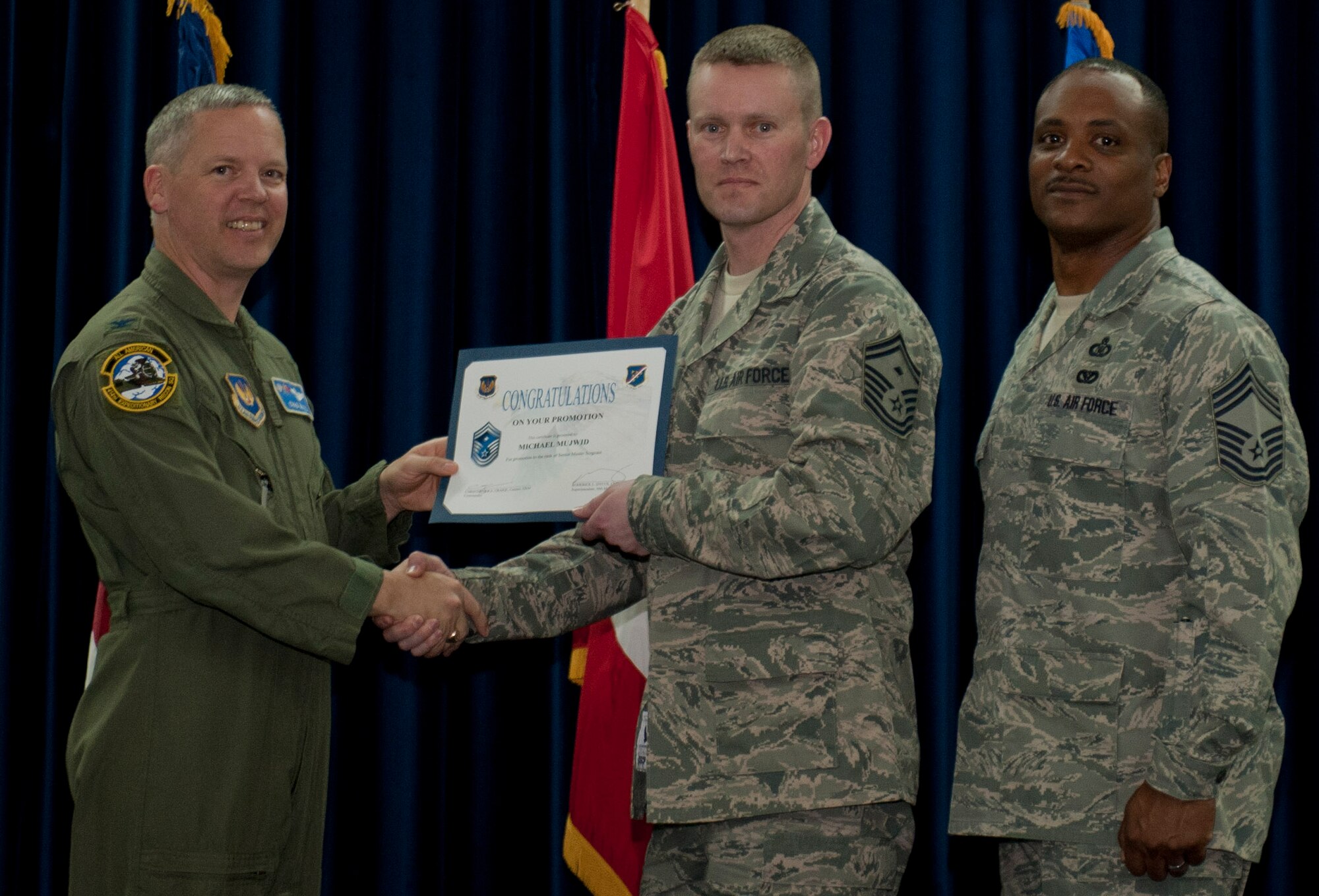 Michael Mujwid, 39th Medical Group, is promoted to the rank of senior master sergeant March 30, 2012, at the Club Complex ballroom at Incirlik Air Base, Turkey. (U.S. Air Force photo by Senior Airman Anthony Sanchelli/Released)