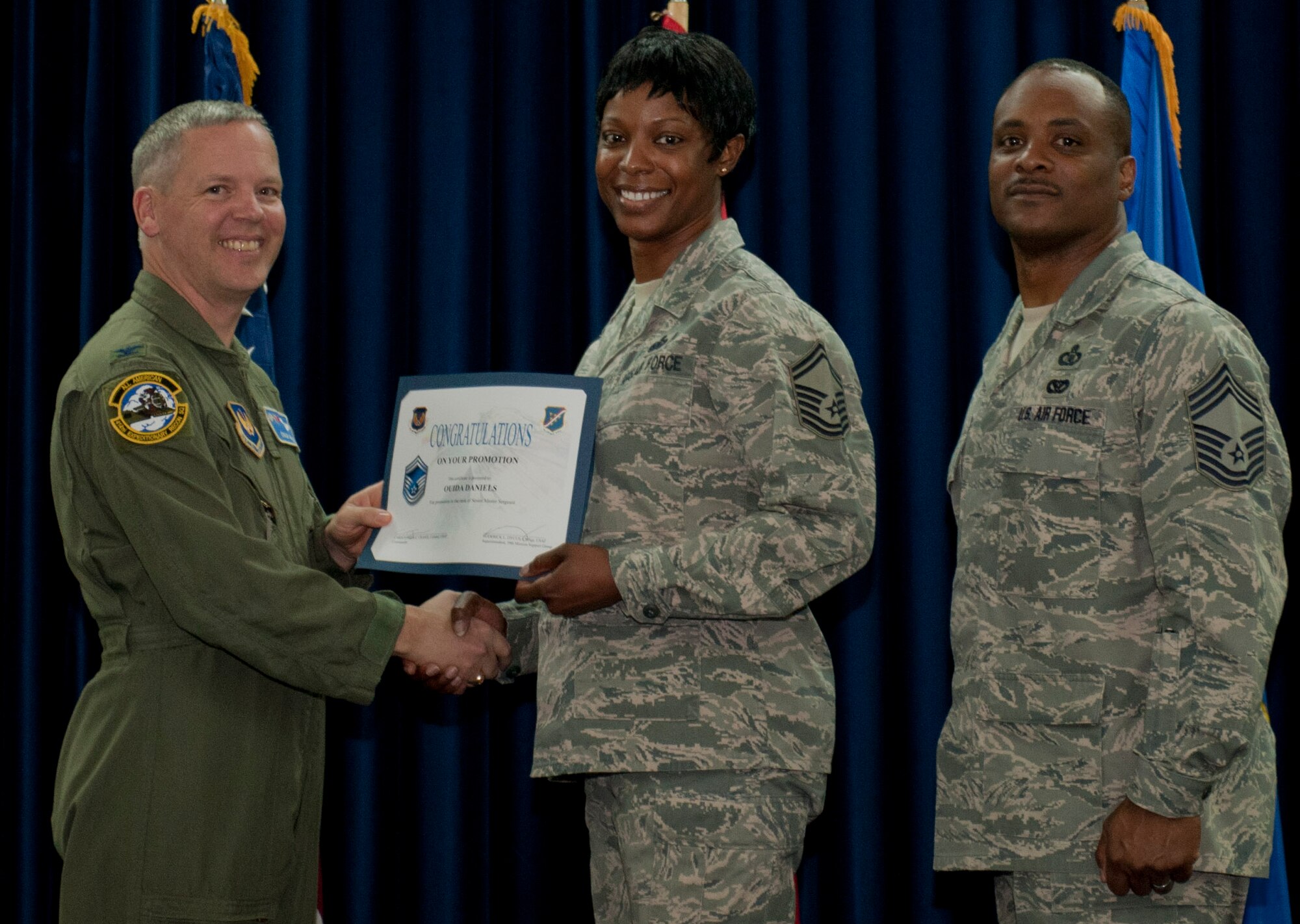 Ouida Daniels, 39th Force Support Squadron, is promoted to the rank of senior master sergeant March 30, 2012, at the Club Complex ballroom at Incirlik Air Base, Turkey. (U.S. Air Force photo by Senior Airman Anthony Sanchelli/Released)